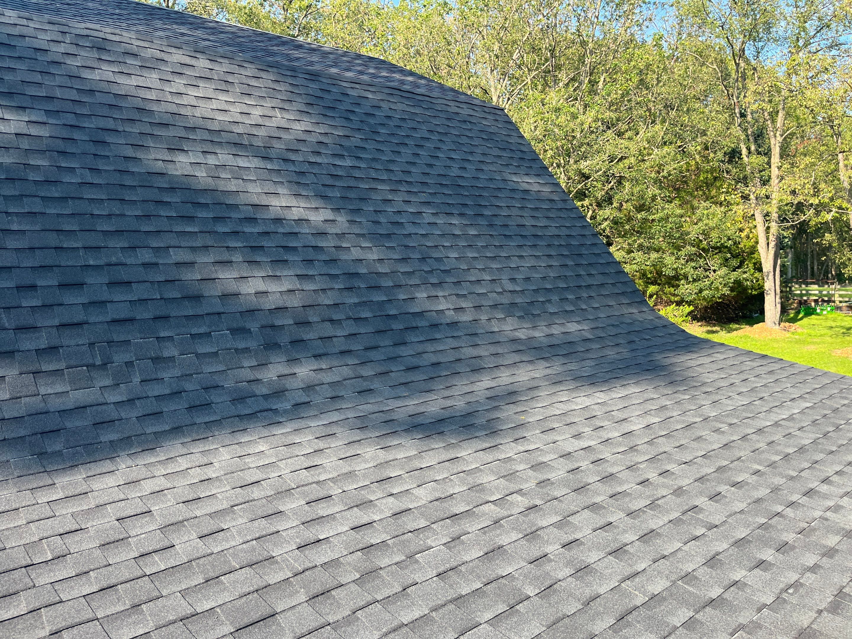 Re-roofing After A Hail Storm in Howell by Acme Exteriors