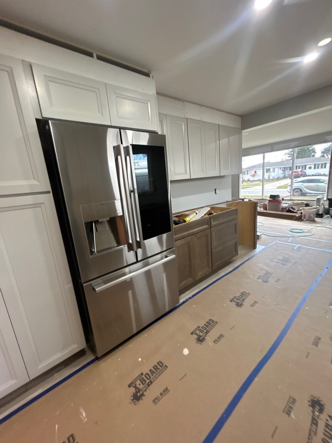 Interior Renovations, Kitchen Remodel, and Window Replacement by Ivy Lea Construction