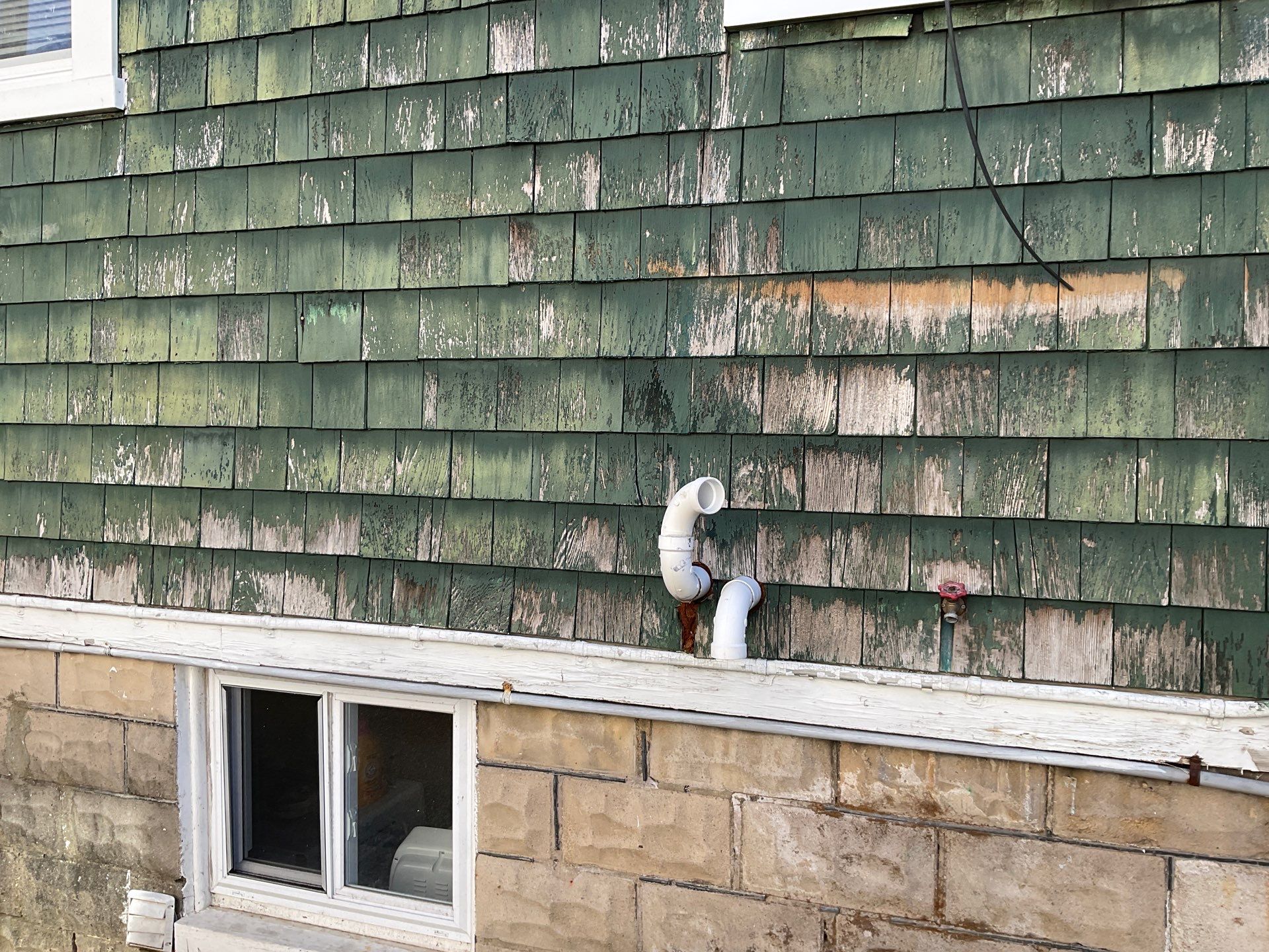 New siding & New Gutters by Alpha Design Services