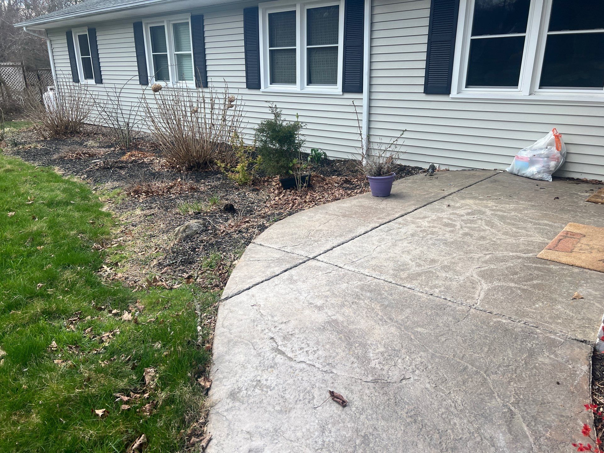 Comprehensive Spring Property Cleanup and Garden Bed Mulching in Orange by Diamond Image LLC