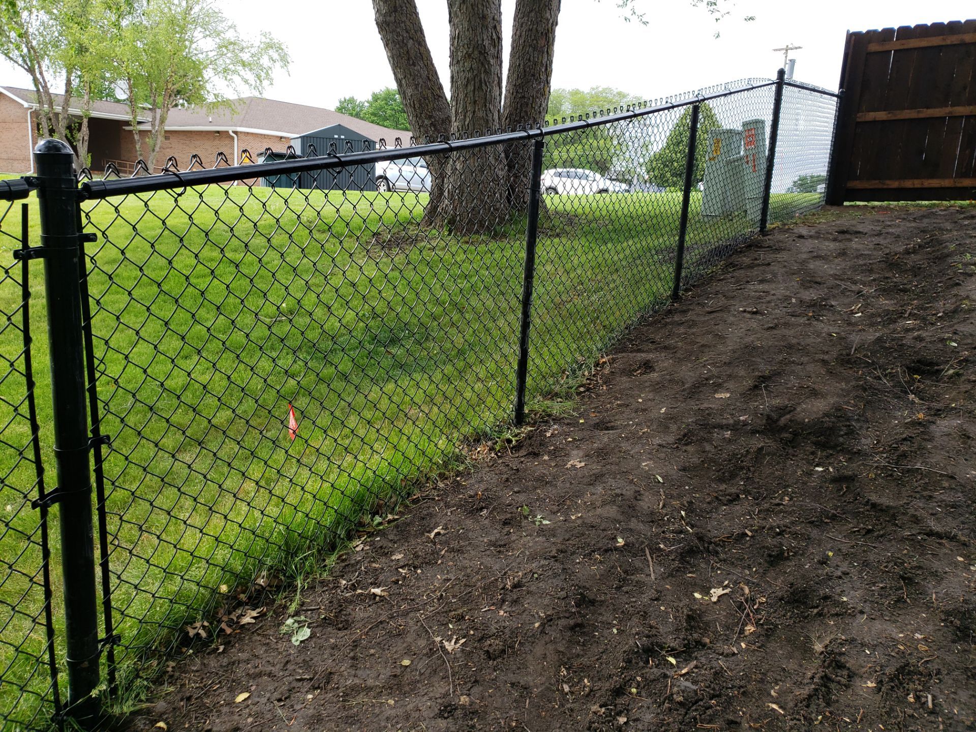 Chain Link and Cedar Privacy in Grundy Center by Perfect Picket Fence and Stain