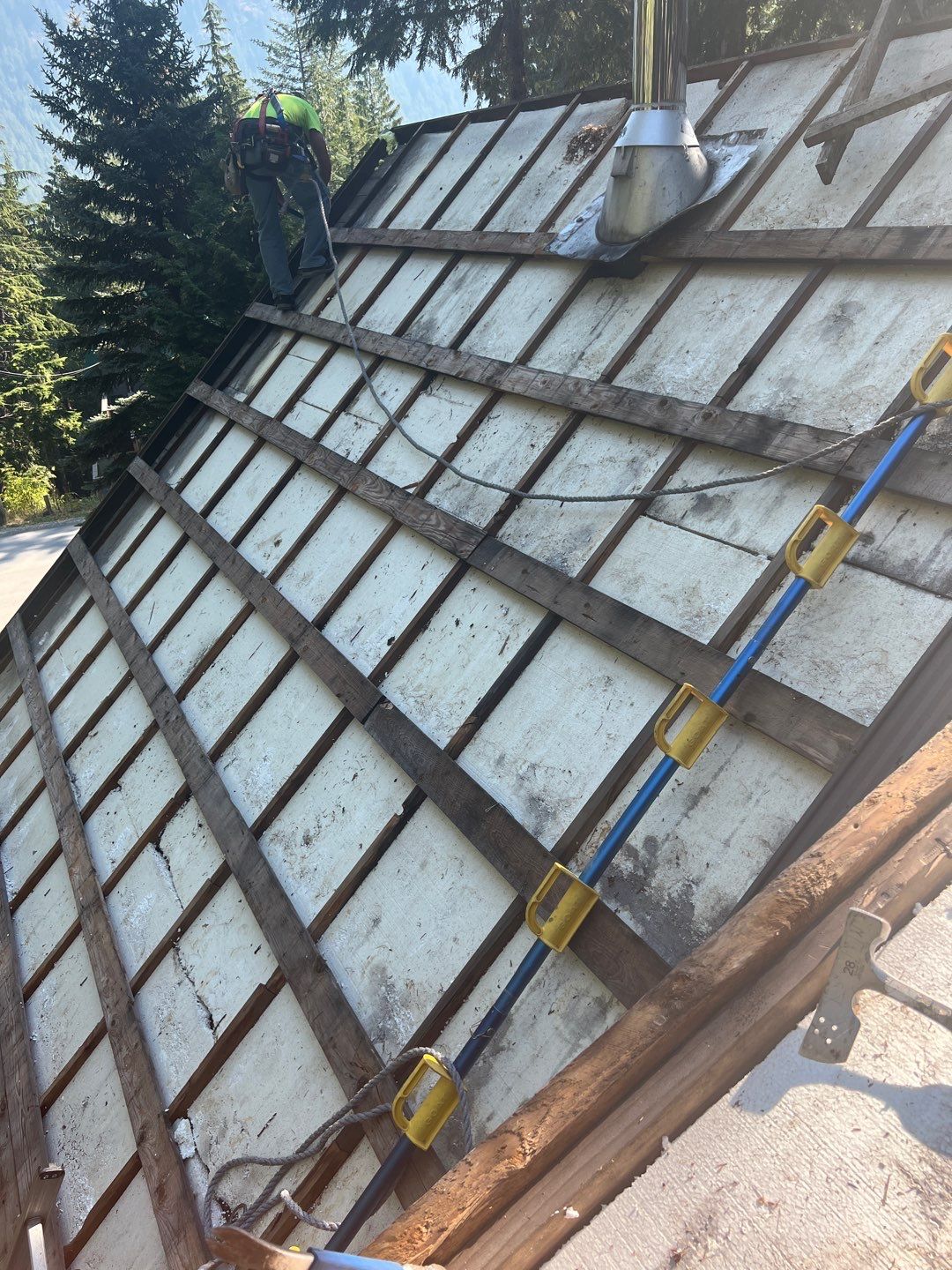 Residential ReRoofing Installation using 12" Prolok metal  by Top Notch Roofing Inc