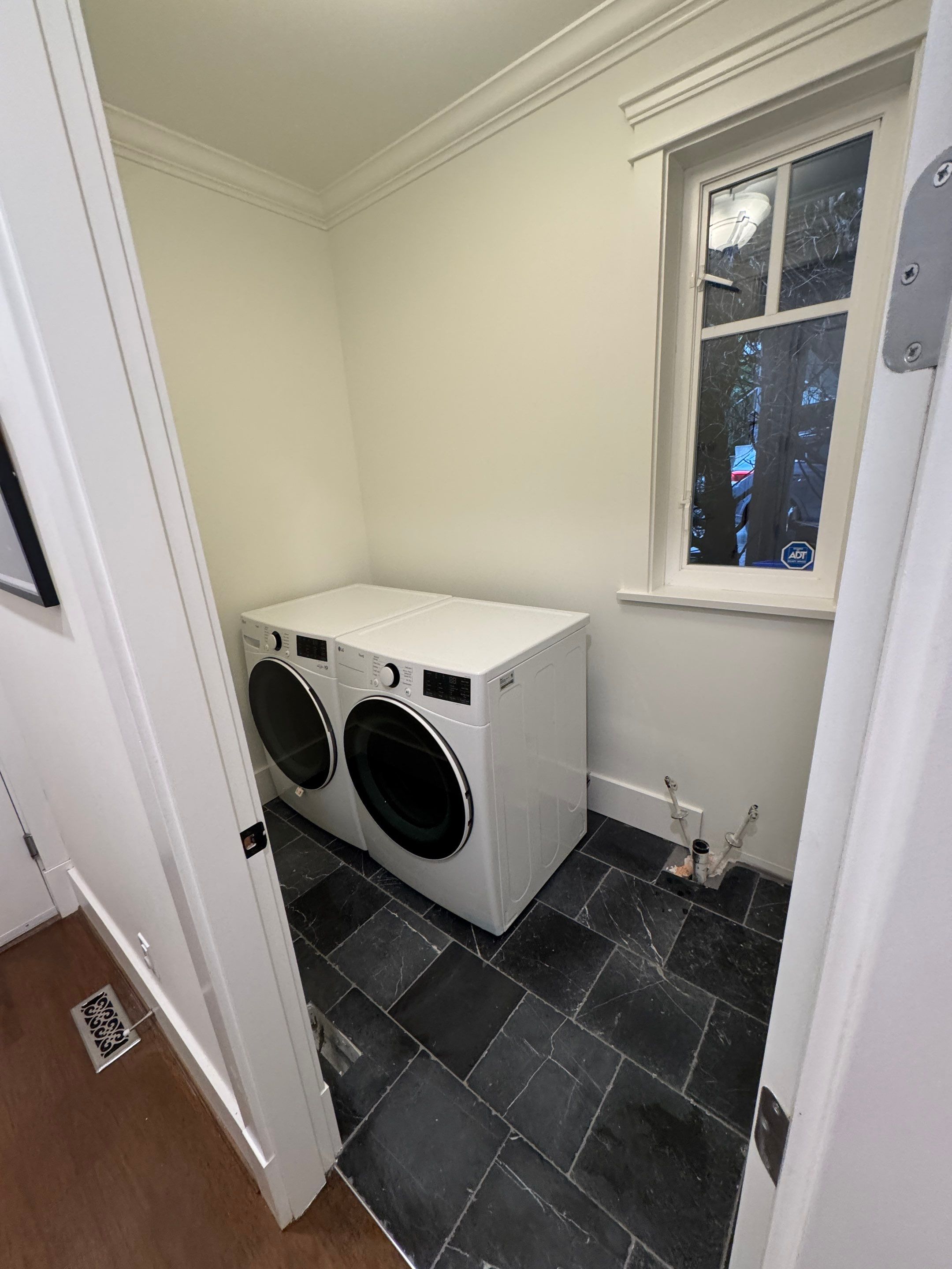 High-End Laundry Room Renovation and Restoration in Vancouver by YVR Construction Group