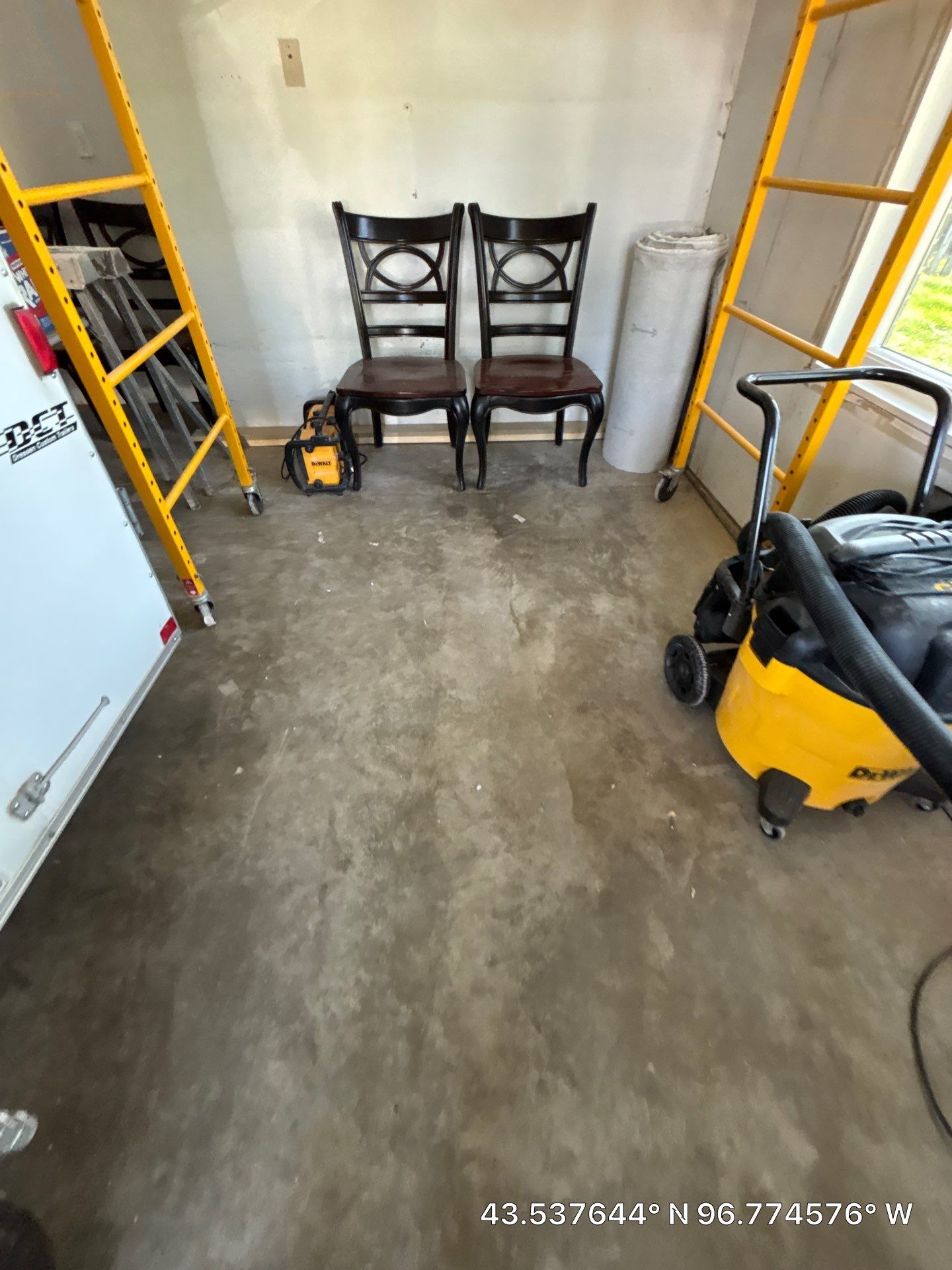 Coyote Flake Concrete Coating for Sioux Falls Garage by Select Painting, Coatings & Garage Cabinets