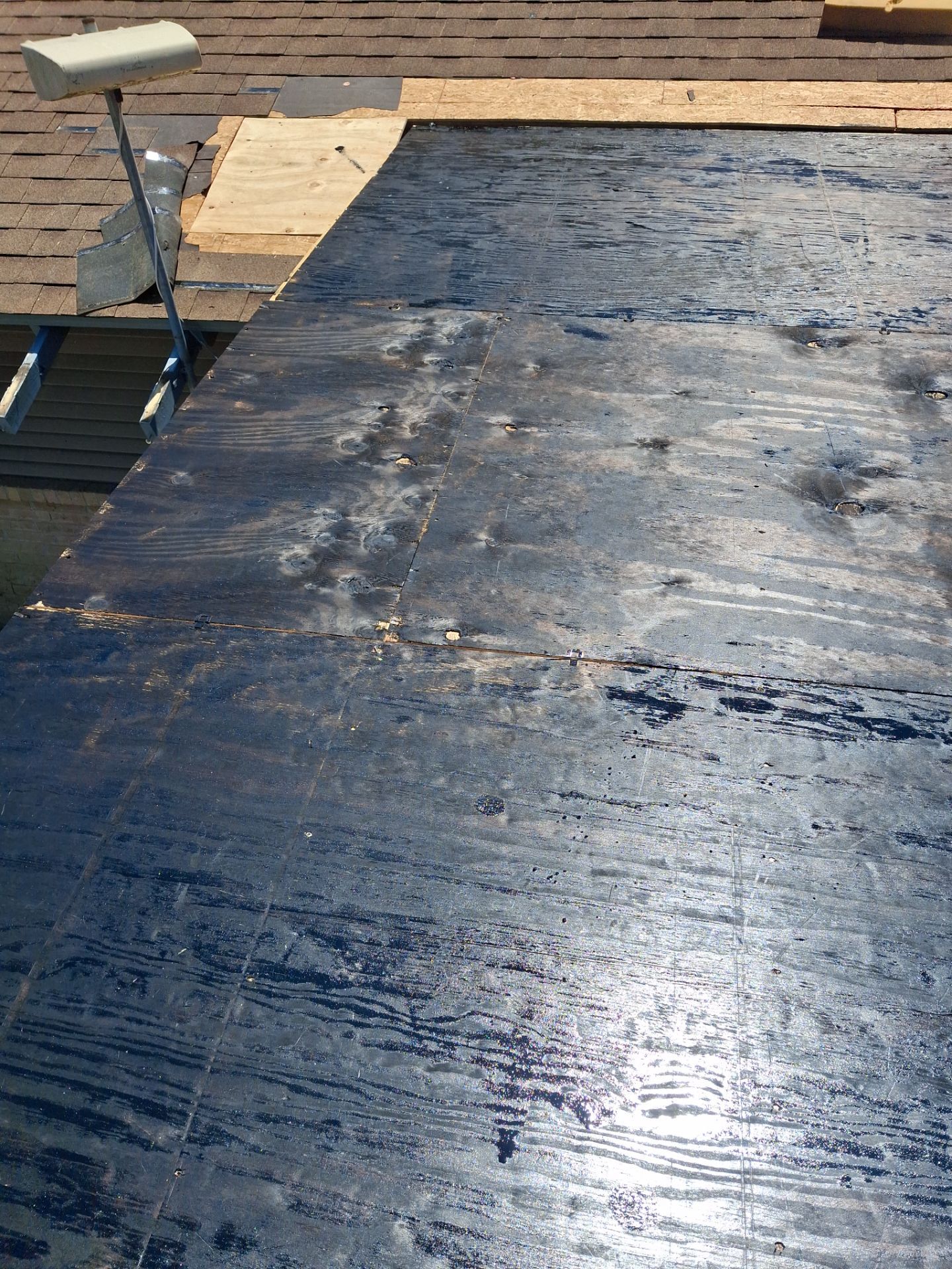 Chimneys need a Cricket.  by Bayfront Roofing and Construction