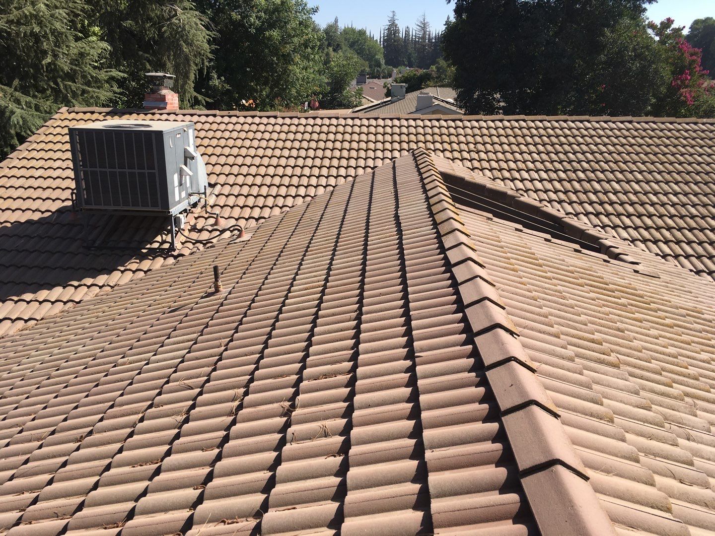 Tile roof remodel/ install OSB sheathing under tile and replace using OSB board with new underlayment, tile, and battens by Straight Edge Roofing Inc