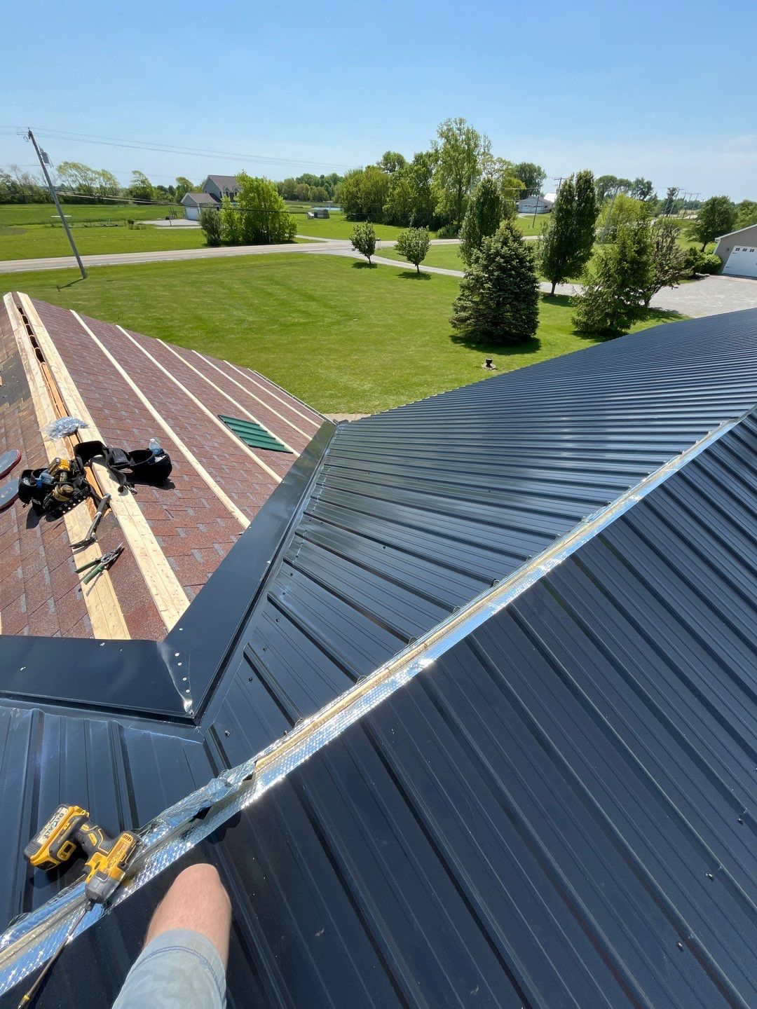 Residential Roofing Installation using Perfromance Panel Metal - Black by RoofX 