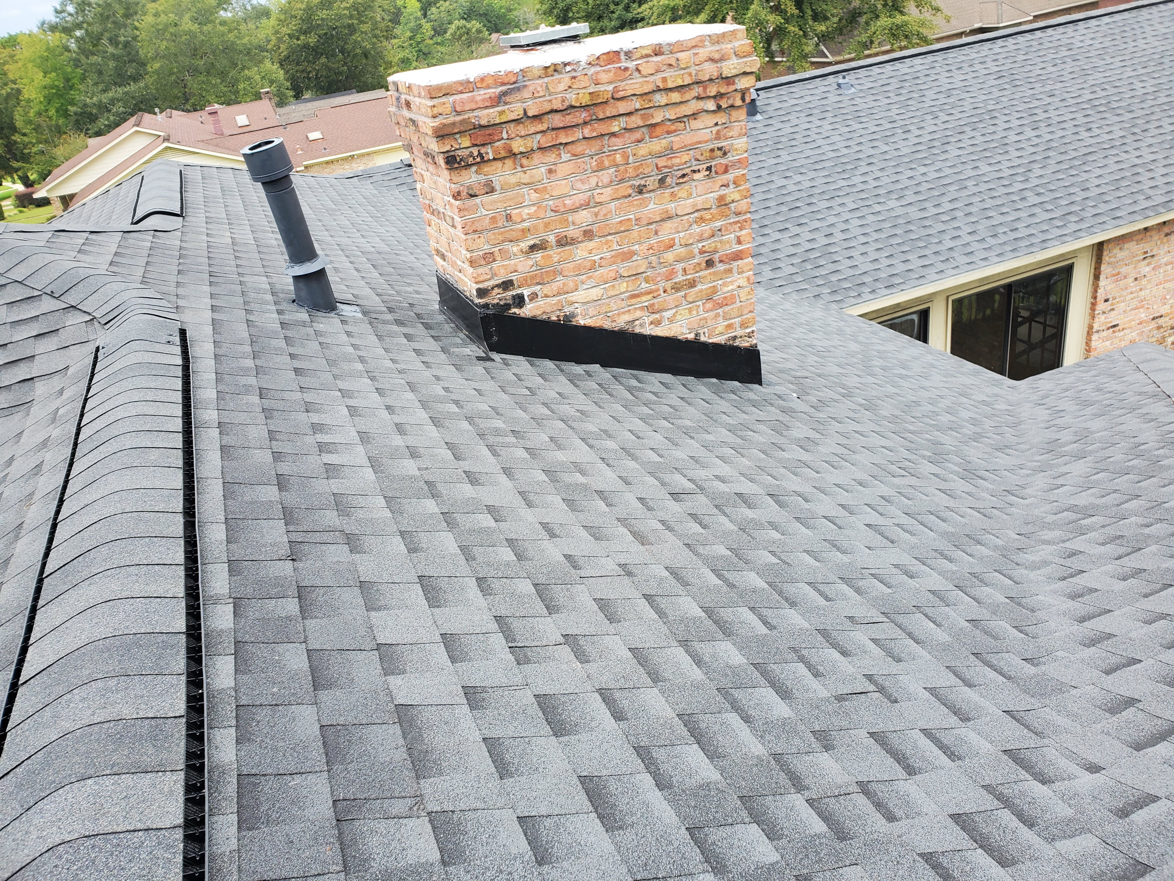 Residential Roofing Installation using Roof Replacement by American Roofing & Construction LLC