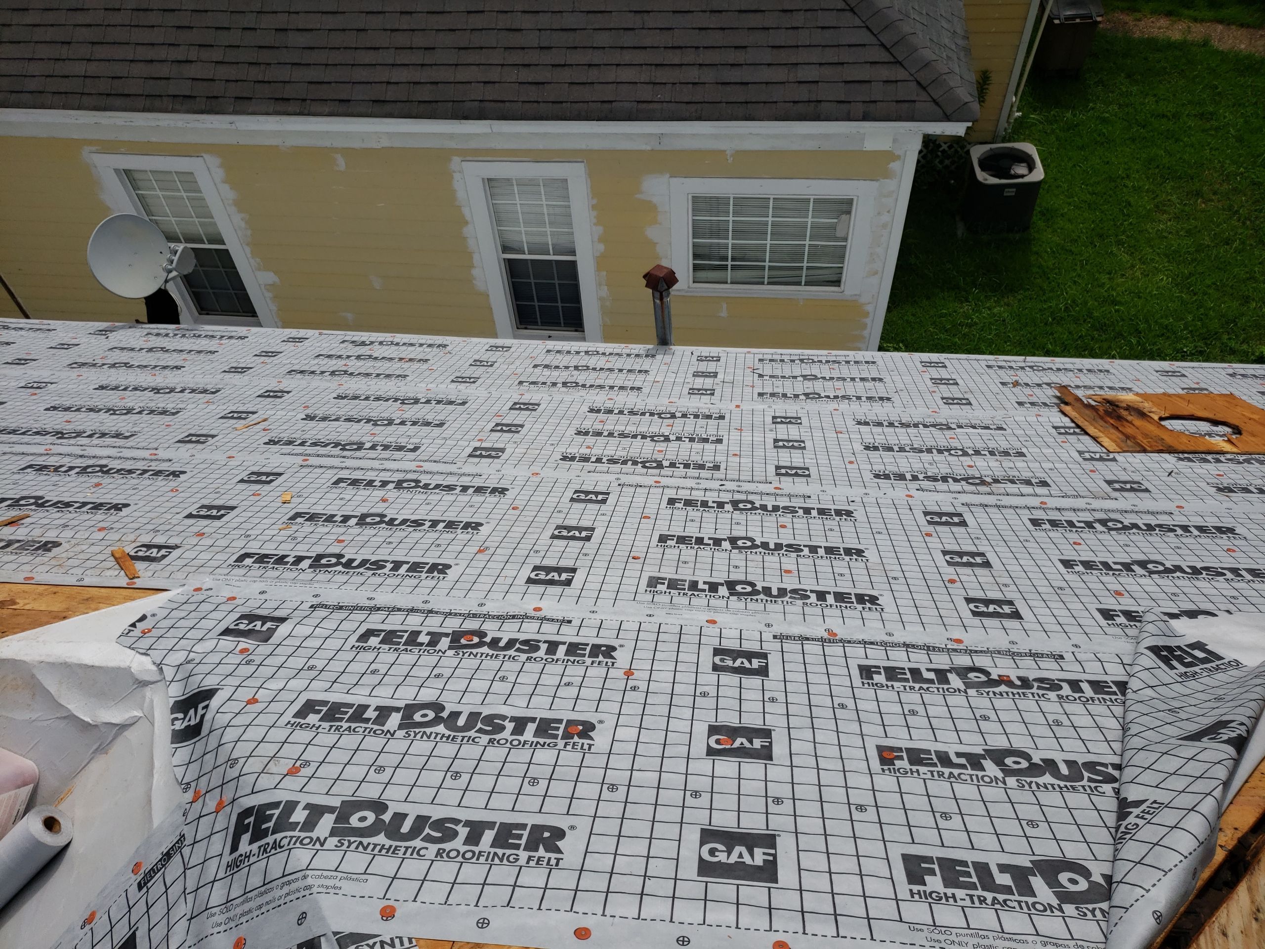 Residential Roofing Installation using Roof Replacement by American Roofing & Construction LLC