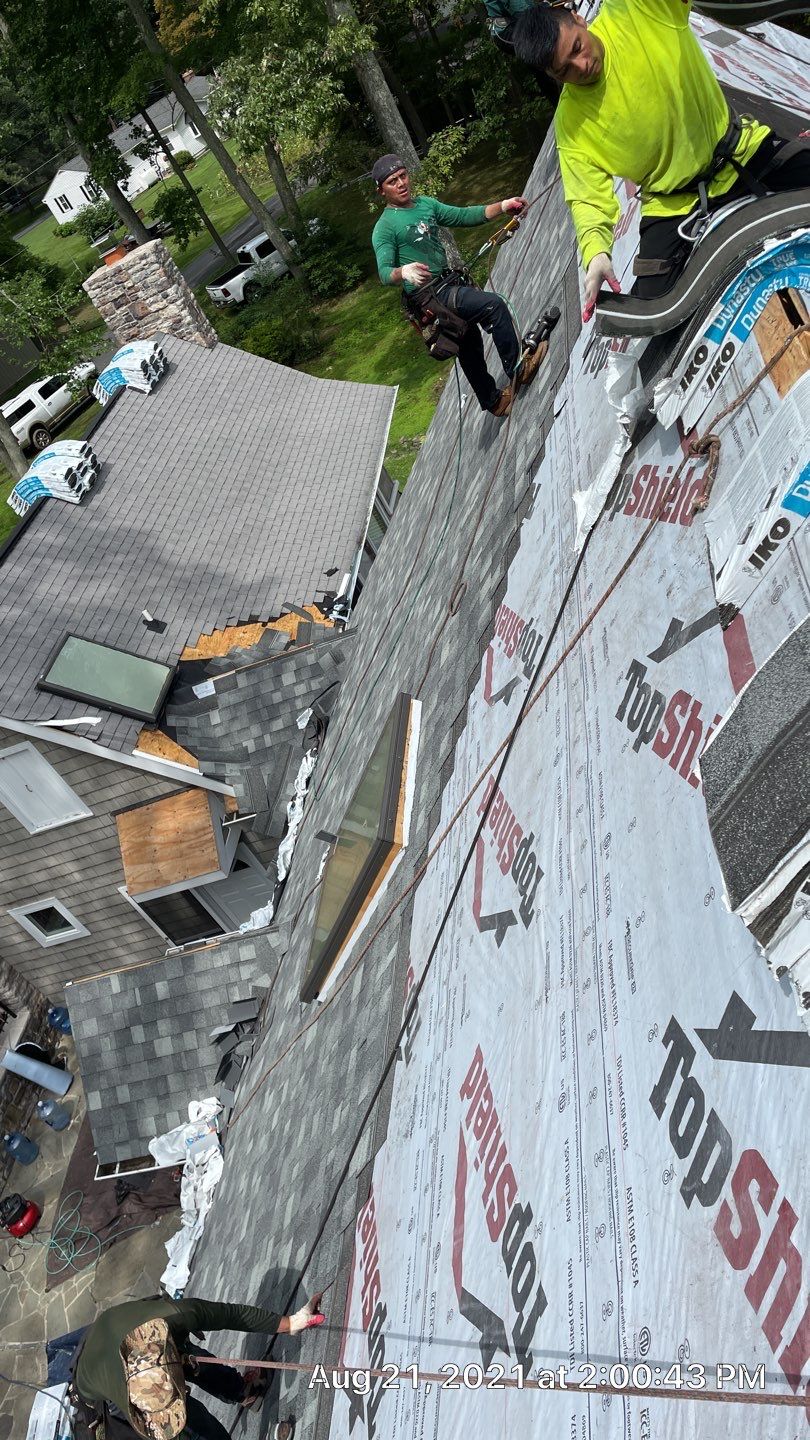 Roof Replacement using IKO Dynasty by American Home Contractors