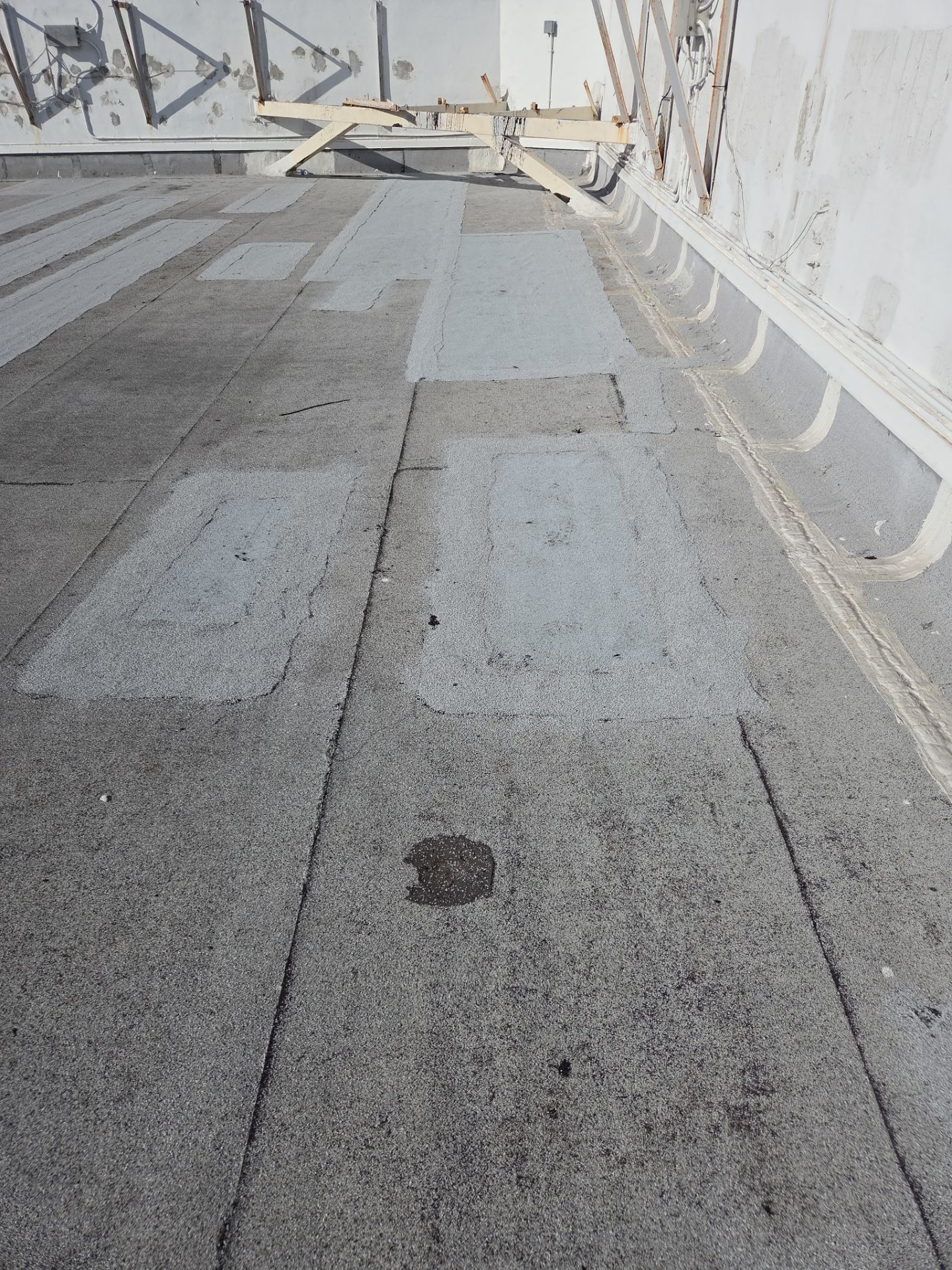 Commercial Flat Roof Restoration Using Silicone Coating in Hallandale Beach by Aastro Roofing