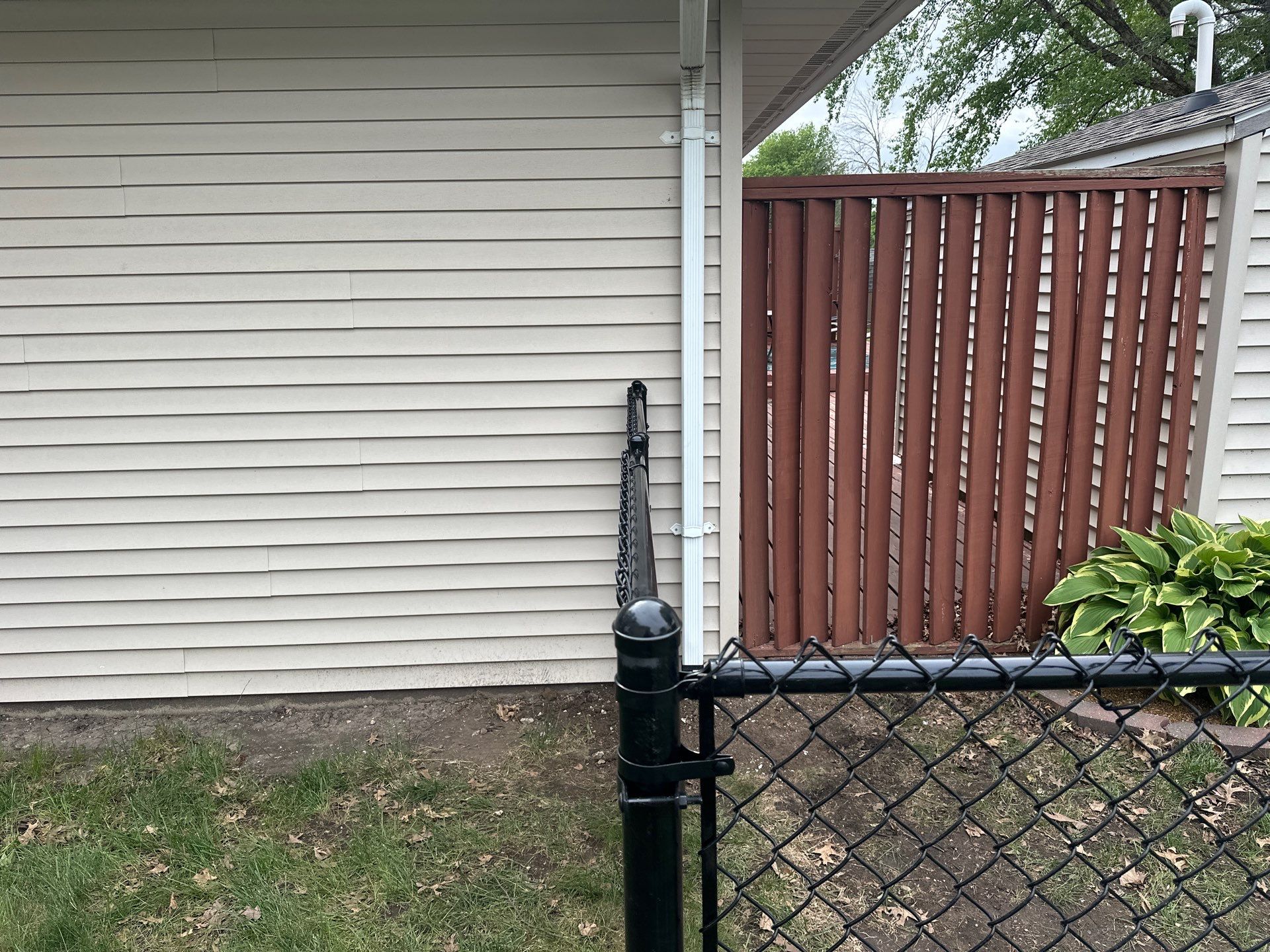 Chain Link and Cedar Privacy in Grundy Center by Perfect Picket Fence and Stain