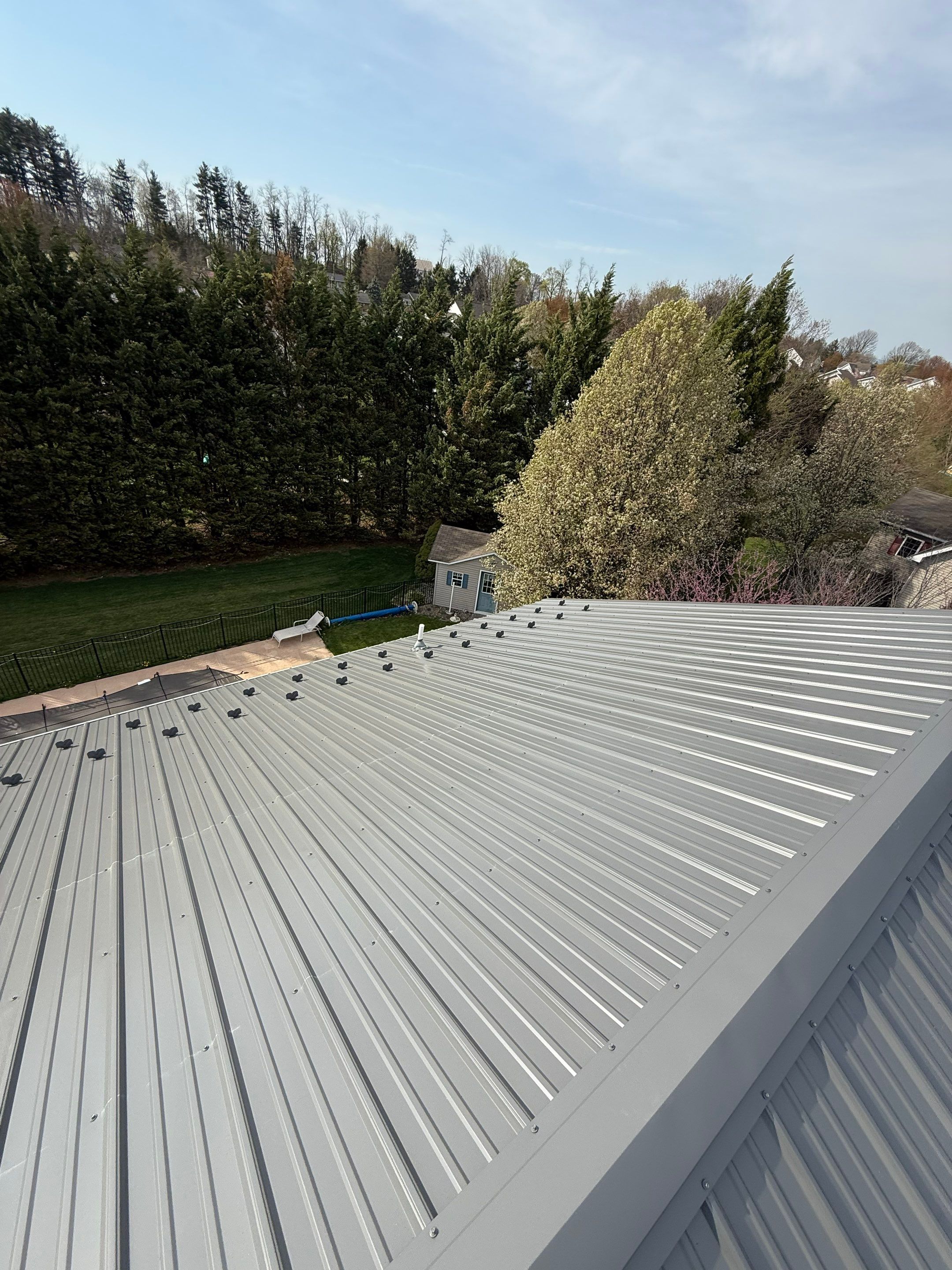 Residential Roofing Installation using Everlast Azm Panel -charcoal by Teflon Roofing