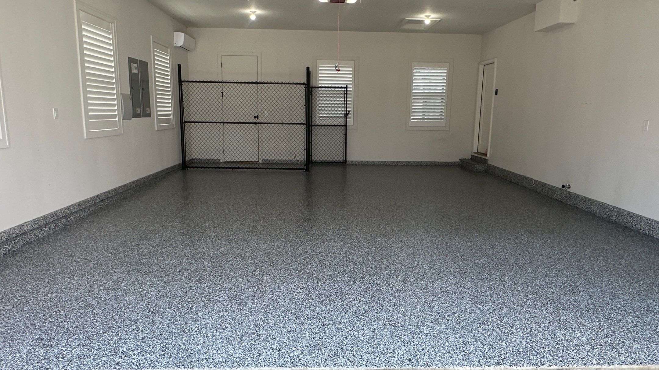 Jim E. went with a beautiful Banner Flake floor  by Banner Garage