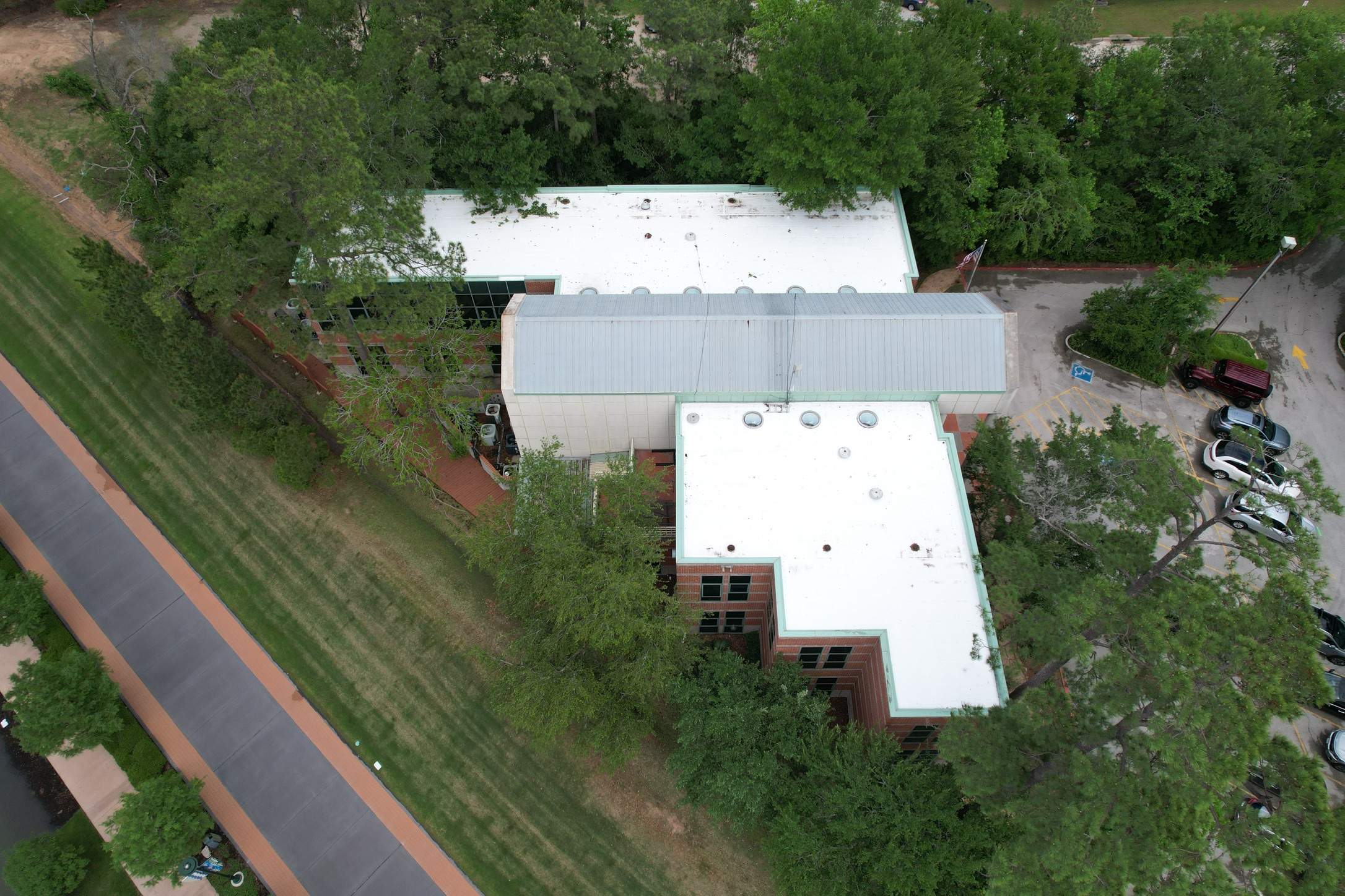 Commercial Roofing Restoration using GAF Unisil Silicone by STX Roofing