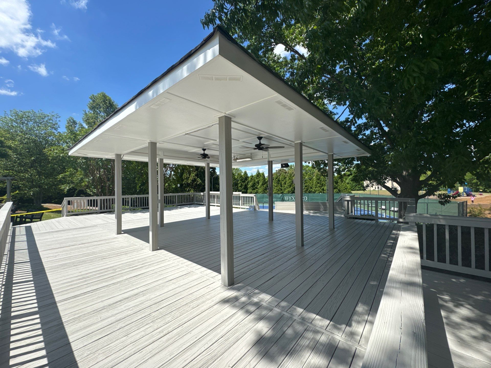 Exterior Deck and Pavilion Painting for Wexford Tennis Club in Roswell by Swift Home Renovations