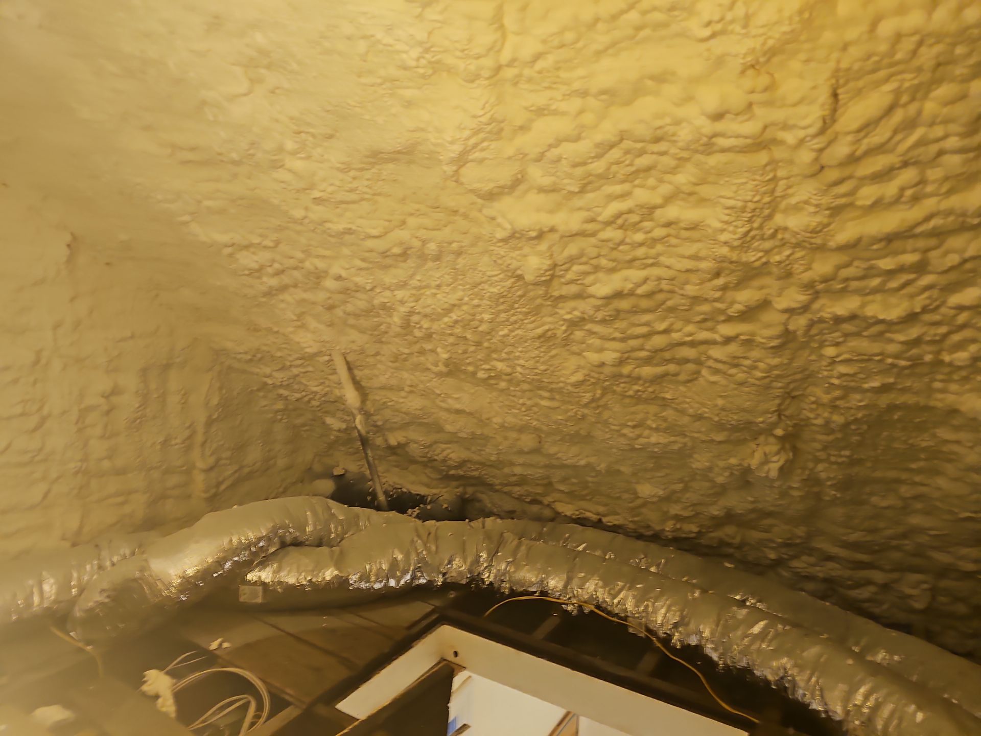 Attic Insulation using Open Cell Spray Foam by NYS Foam & Energy