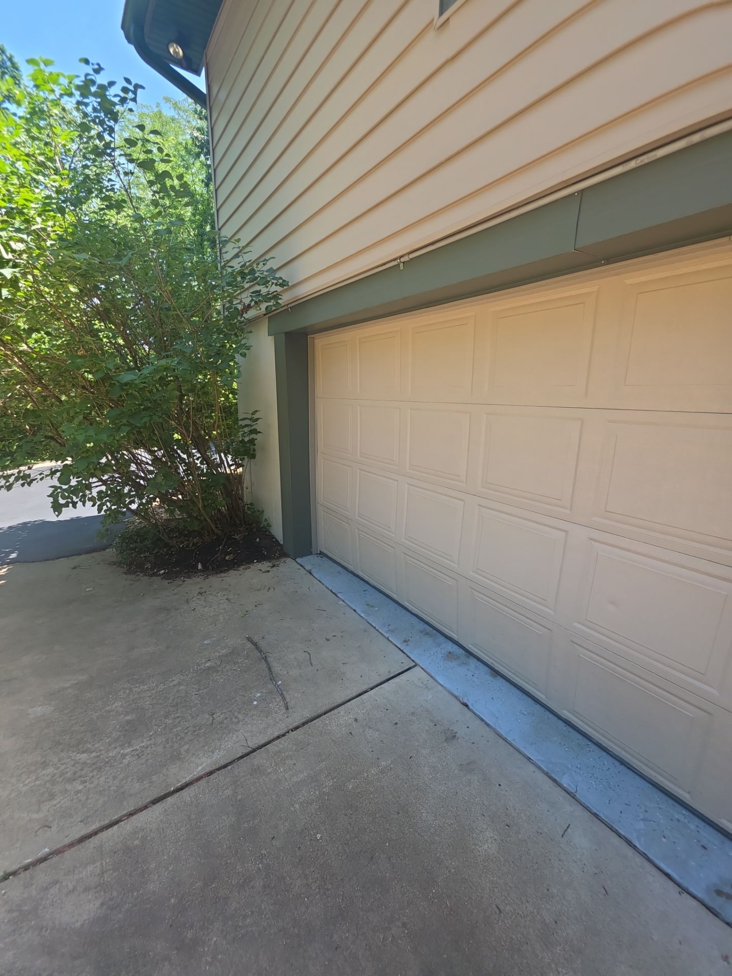 Exterior Entry Door and Garage Door Painting by Legendary Services Company LLC.