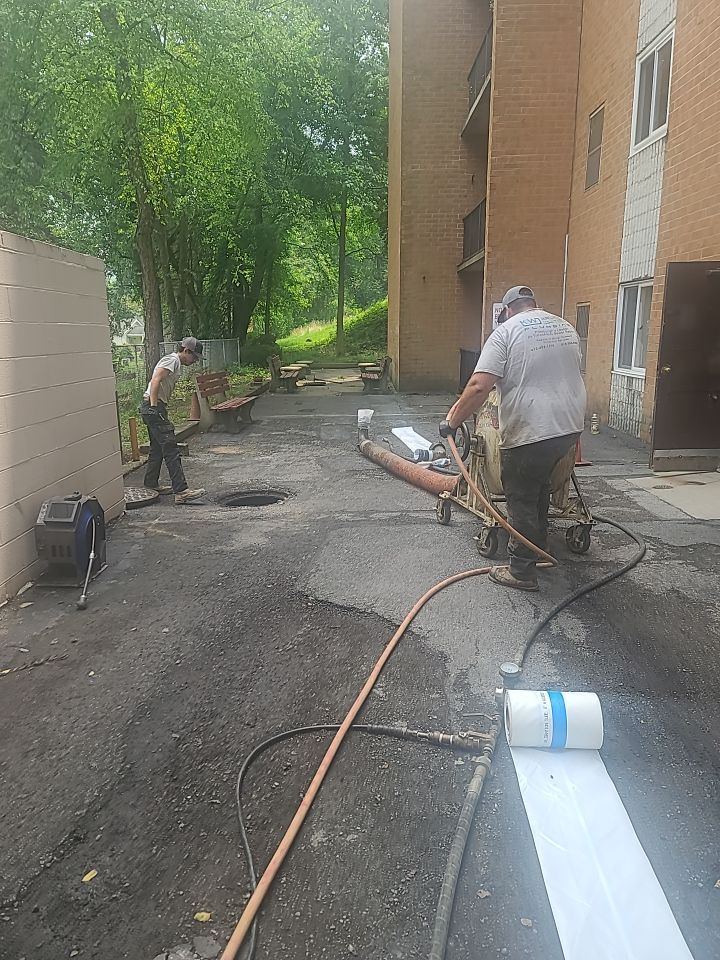 Sewer Repair using Perma-Liner through two manholes by Sureway Comfort John Wilcox Plumbing Heating Cooling