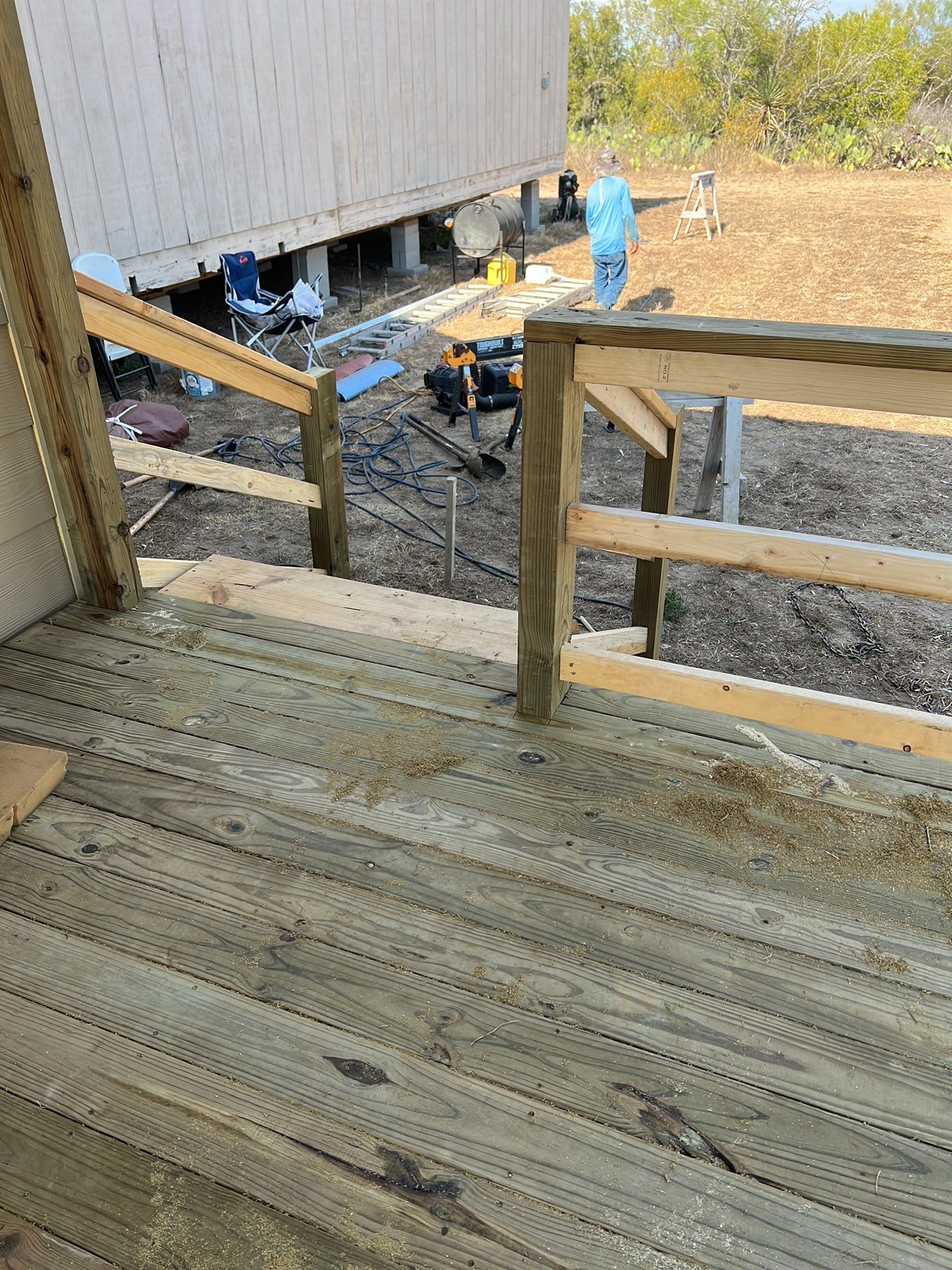 Front Porch Sitt'n by Bayfront Roofing and Construction