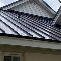 24ga 1.5" Mechanical Seam Dark Bronze by Total Roofing System The Metal Roof Experts