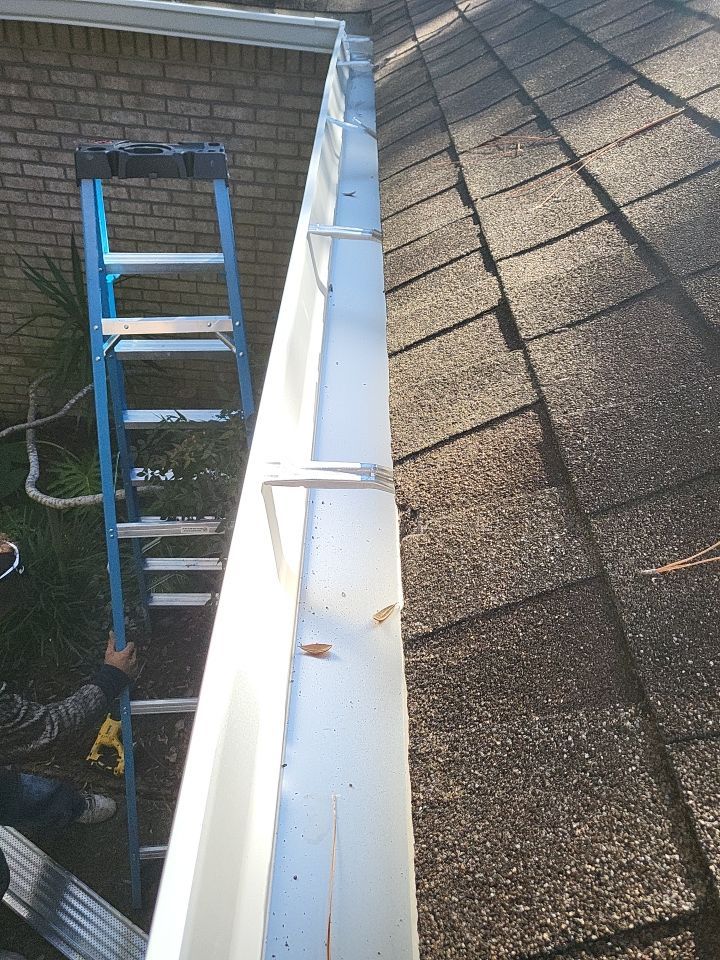 Seamless Gutter Installation using K-Style Seamless Gutters and LeafBlaster Pro Gutter Guards by Gutter Professors