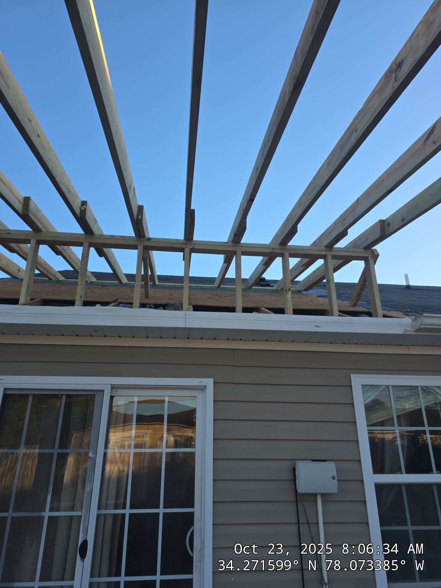 Covered Porch Build and Fortified Roof Replacement with Solar Panels by RGR Construction and Roofing, LLC