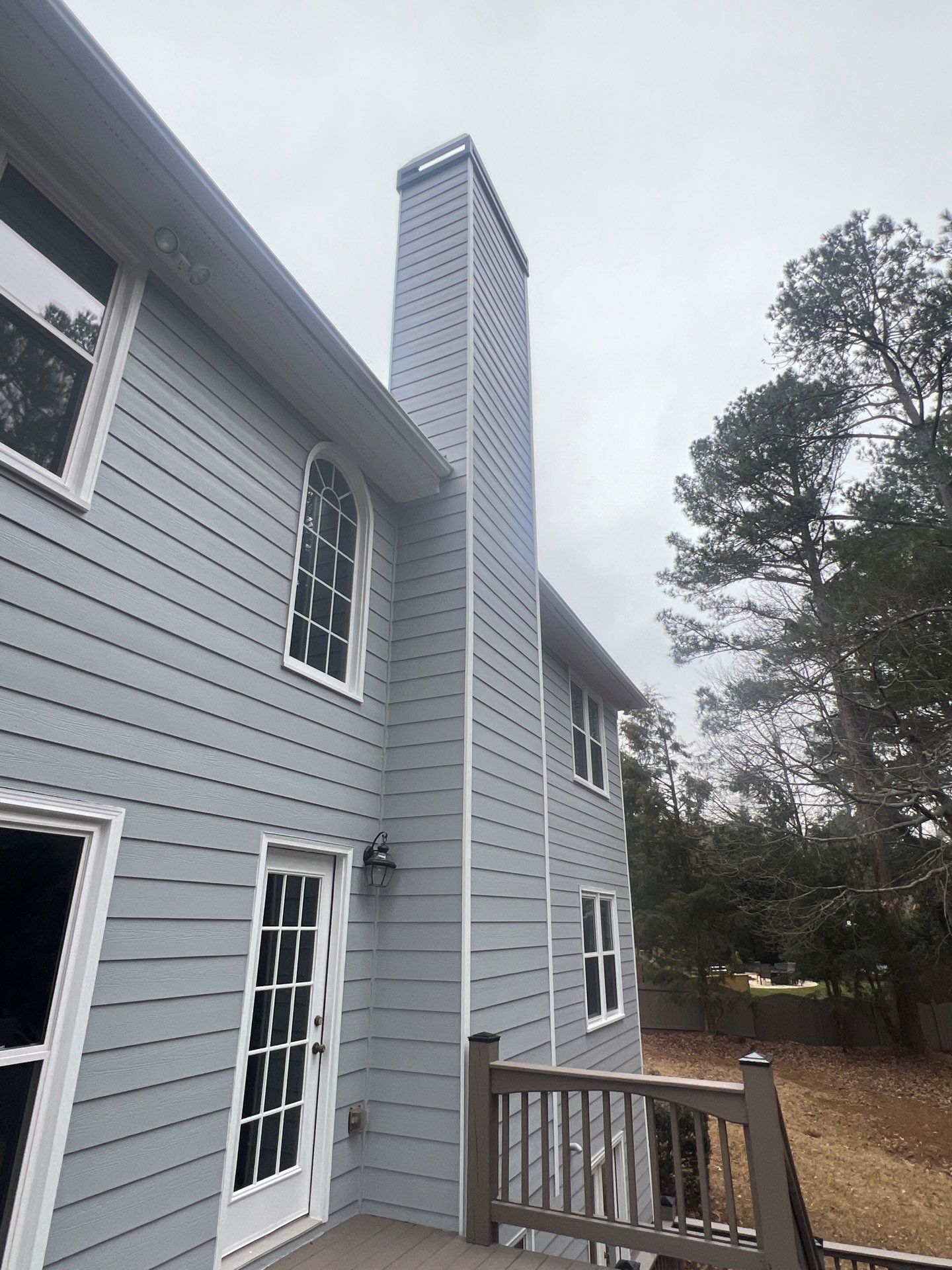 Chimney Siding Reconstruction and Full Exterior Painting in Marietta by Swift Home Renovations