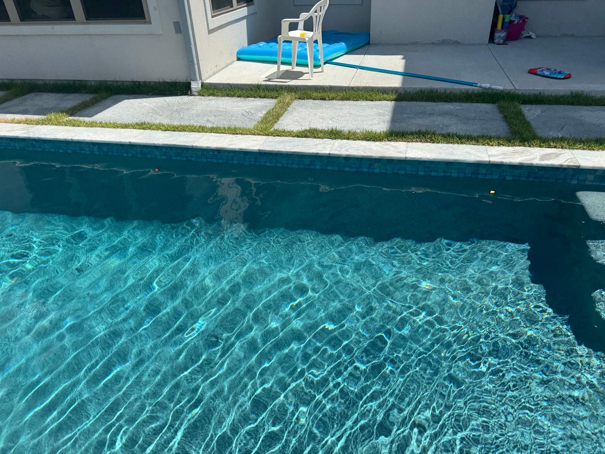 Geometric Pool with Raised Spa and Tanning Ledge by Pinnacle Pools and Spas - DFW
