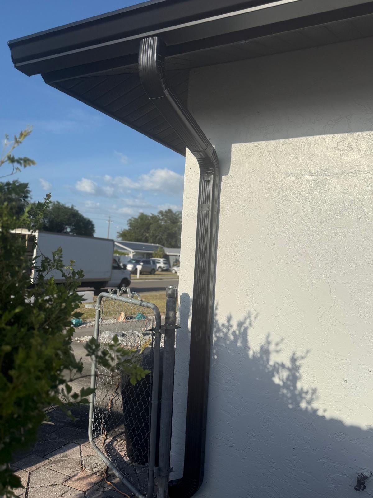 New Downspouts and Splash Guards in Sarasota FL by Gutter Professors
