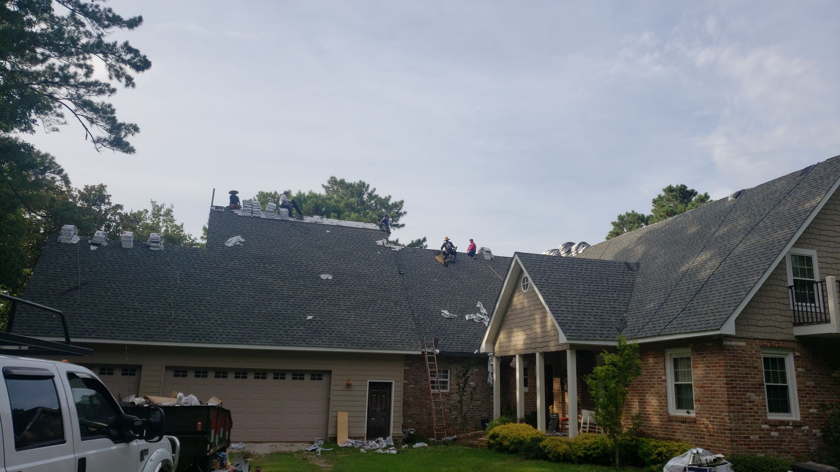 Residential Roofing Installation using Roof Replacement by American Roofing & Construction LLC