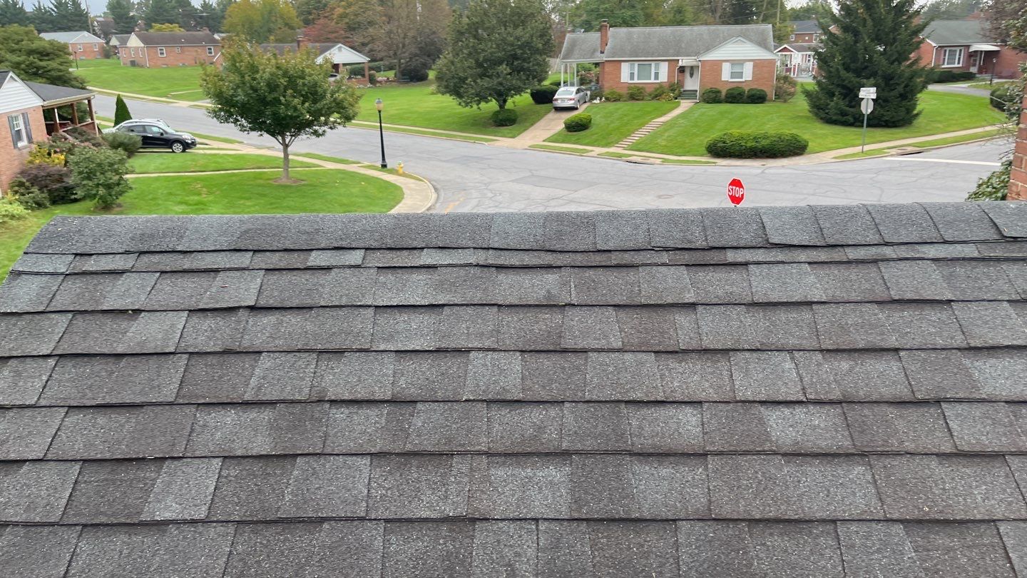 Residential Roofing Installation using Atlas Pinnacle Pristine Black Architectural Shingles by Frederick Roof Repair