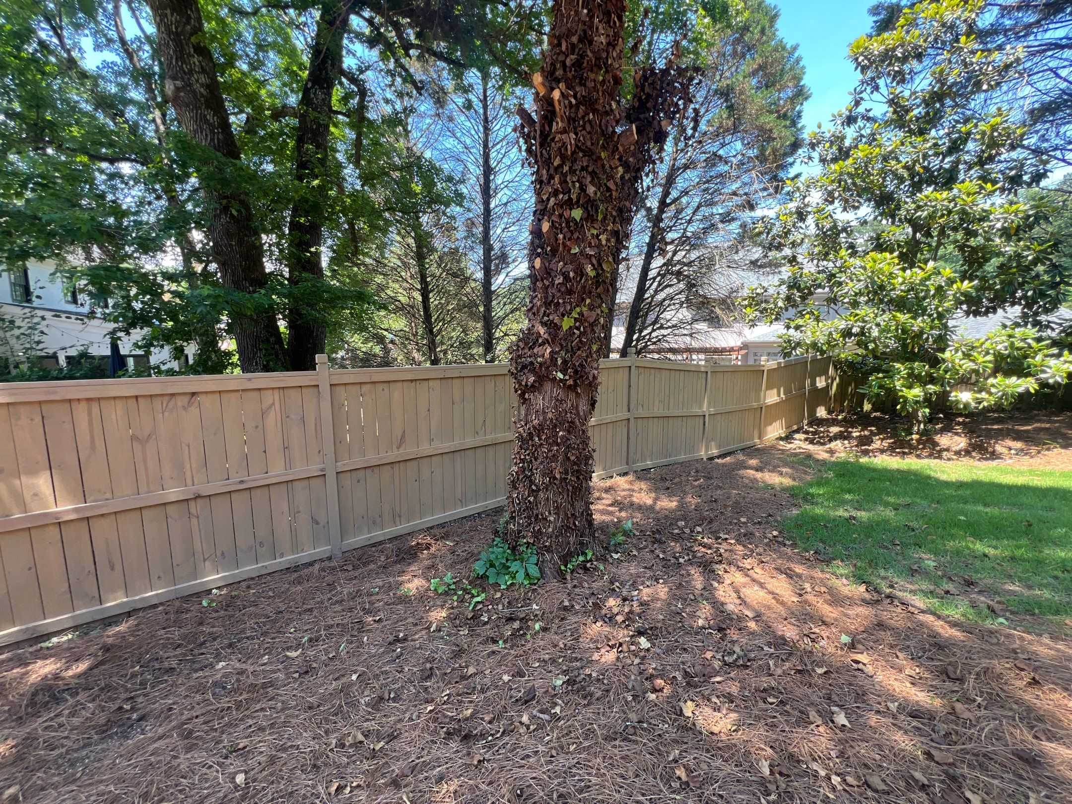 Pressure-Treated Wood Fence Installation and Deck Staining in Atlanta by Swift Home Renovations