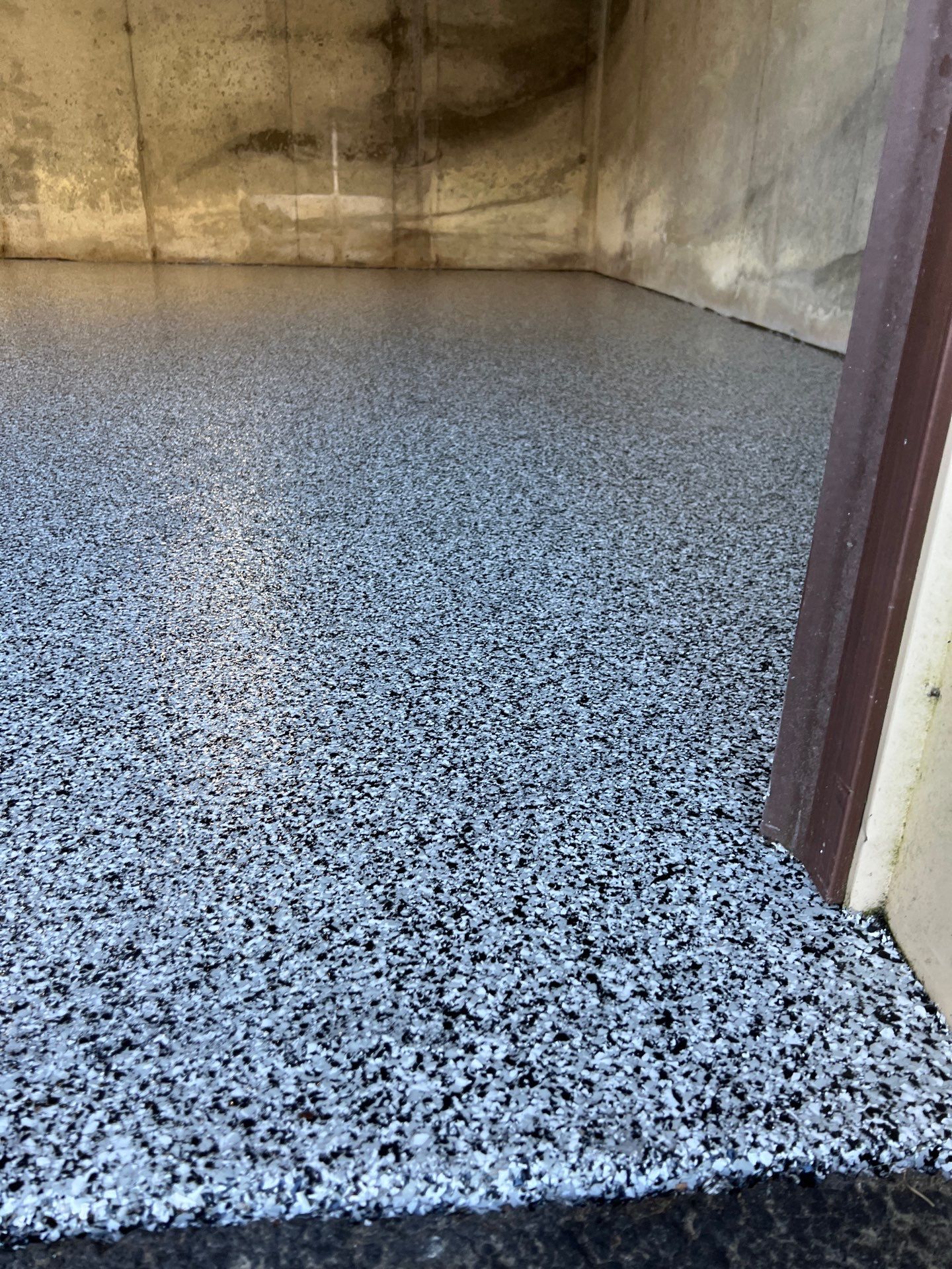 Garage in Londonderry, NH 03053 by Symphony Concrete Coatings