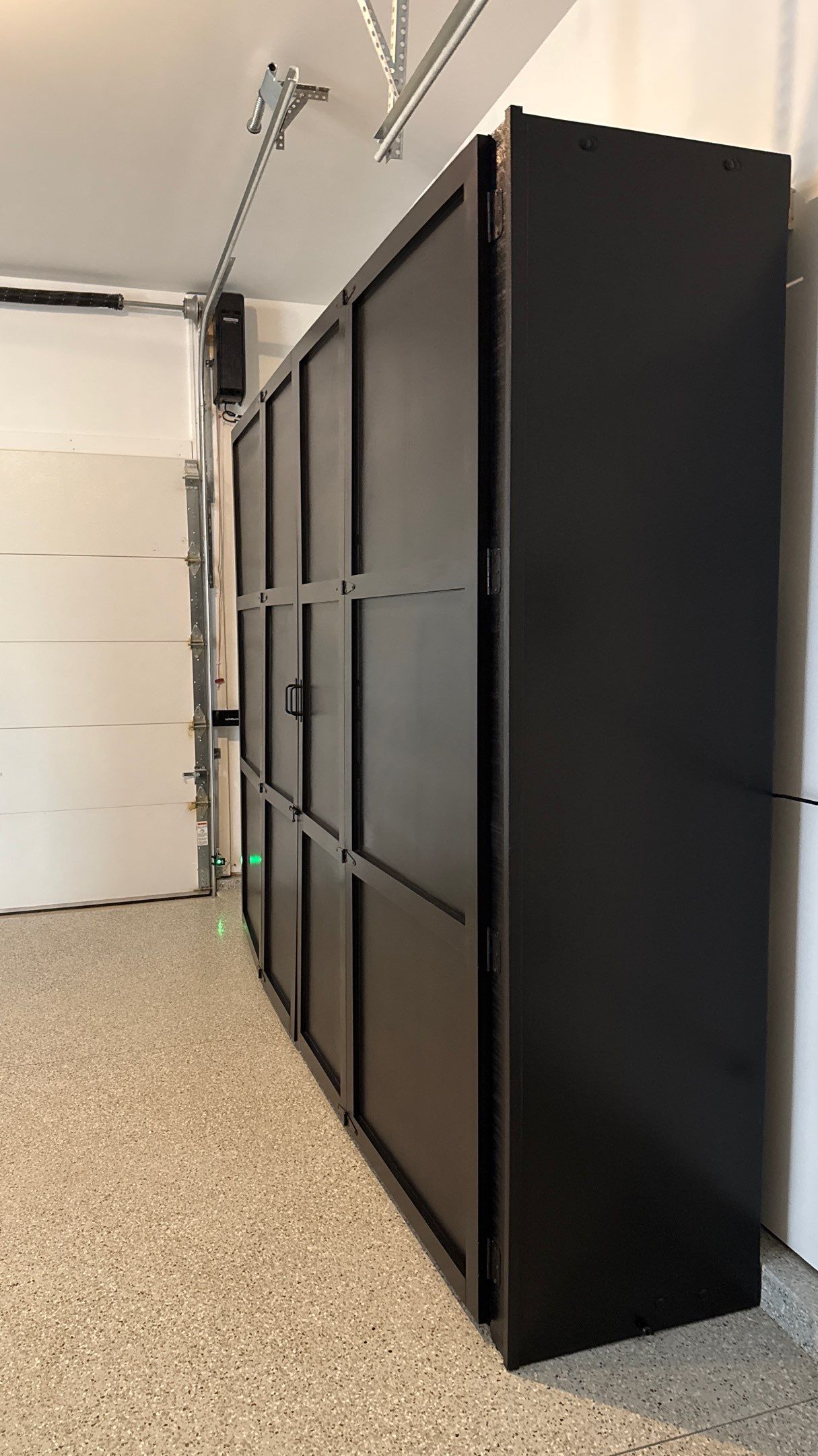 Ben Took It To The Next Level With a Golf Simulator by Banner Garage