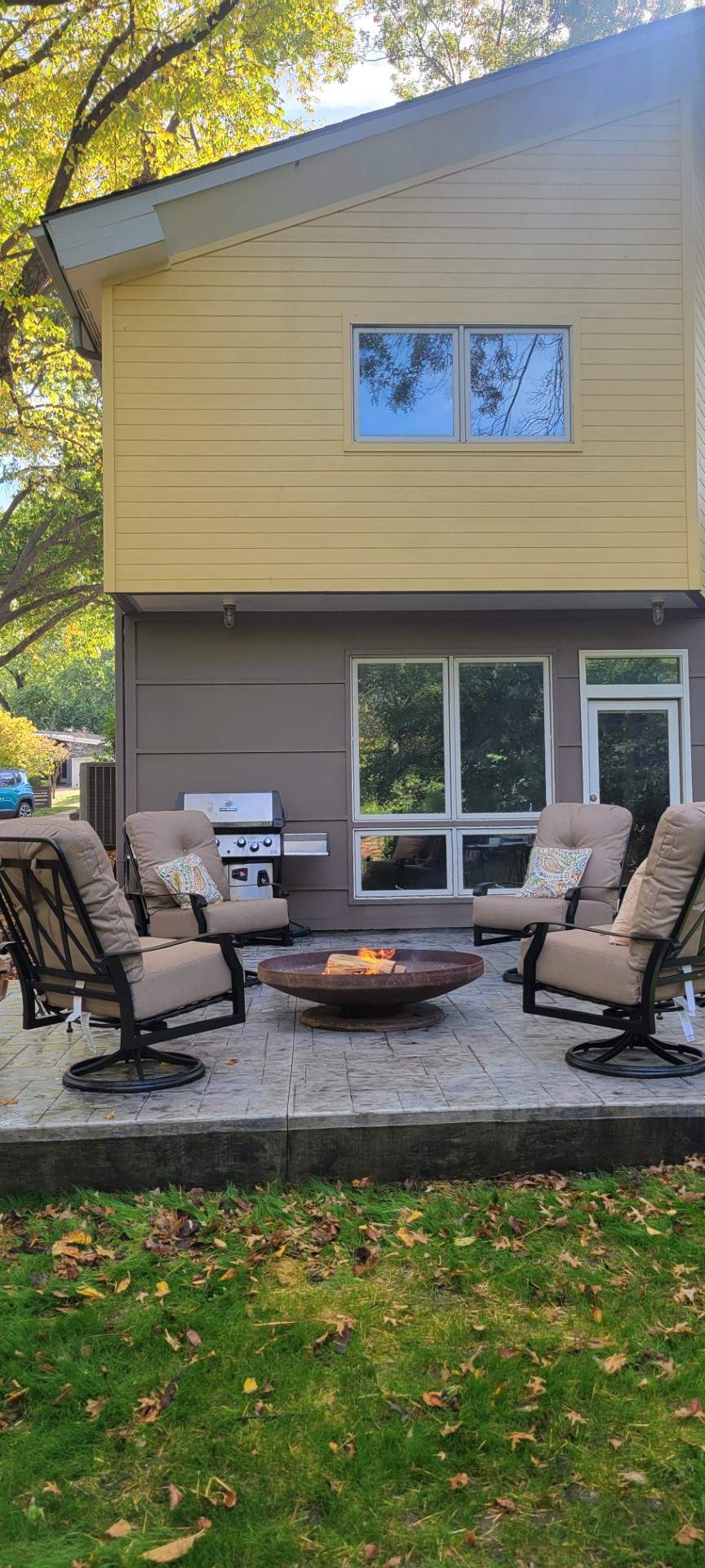 Back Yard Cantilivered Patio by LAND ESCAPES LLC