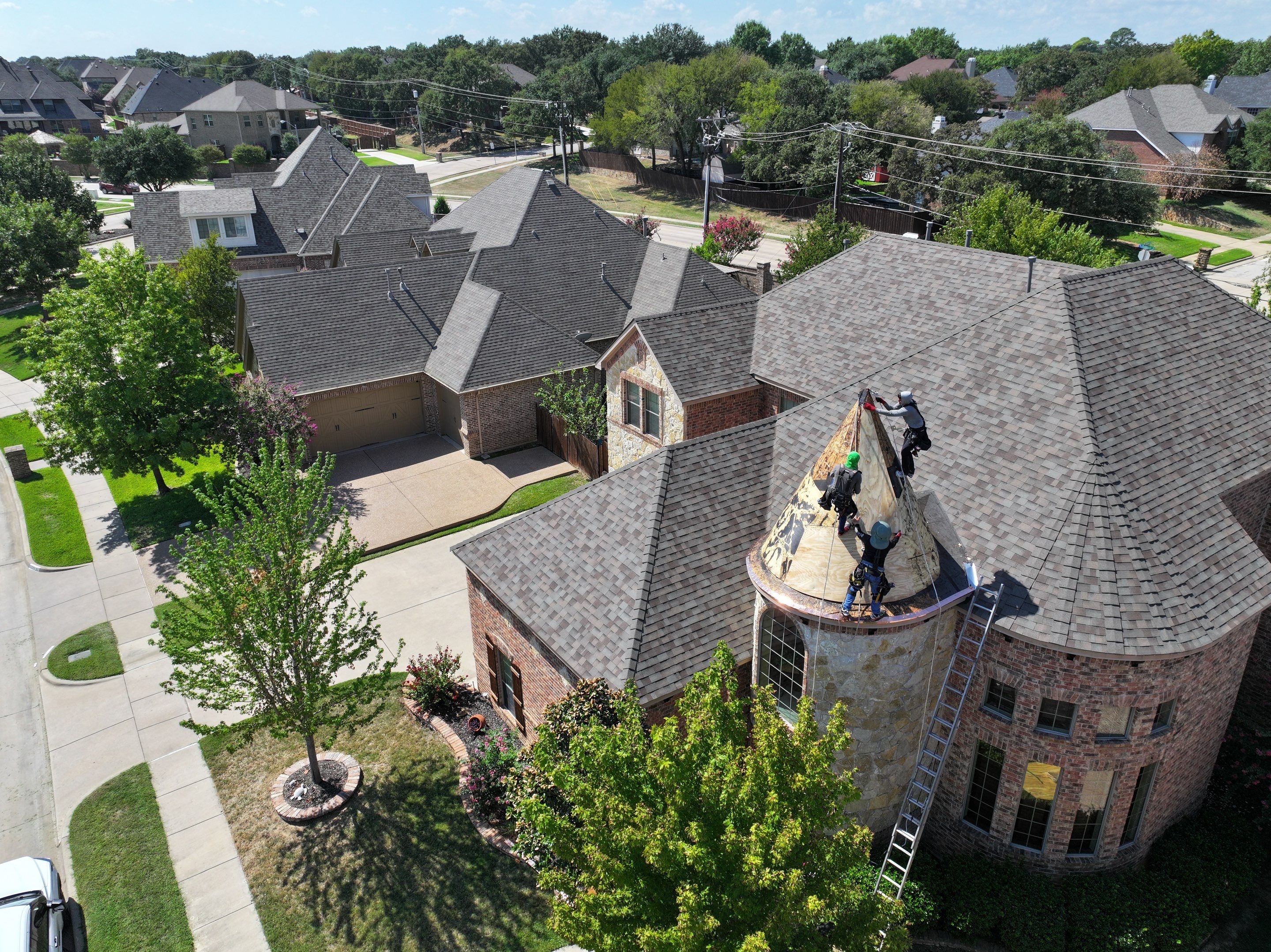 Installing Custom copper turret and Malarkey Vista Class 4 shingles Hail Damage Upgrade by Becker Roofing and Exteriors