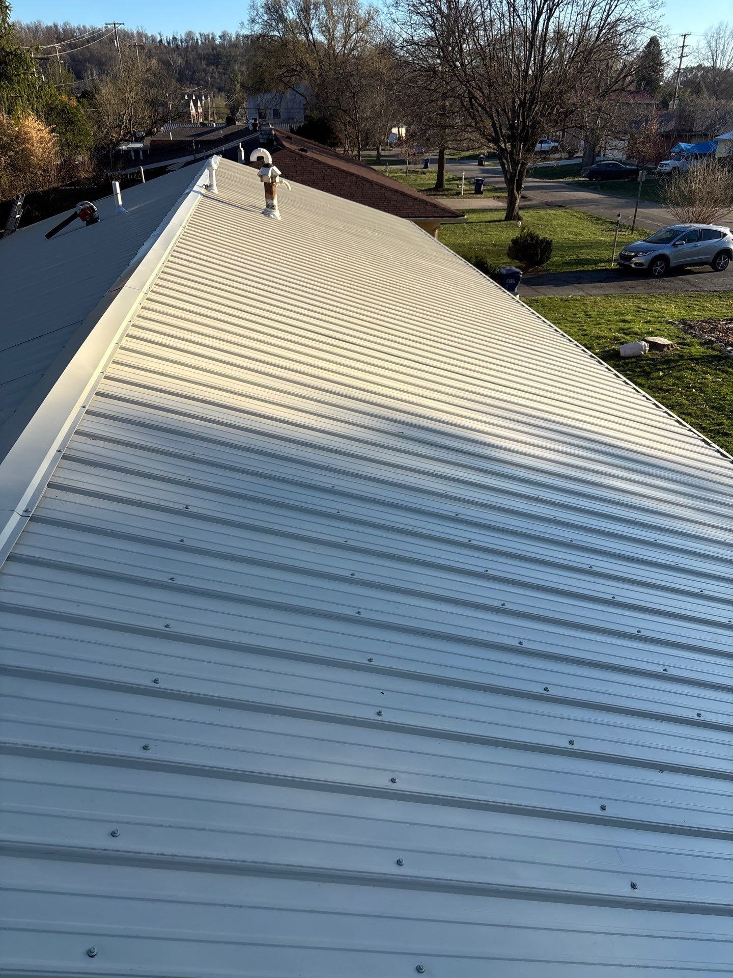 Residential Roofing Installation using Metal by Rainstoppers Roofing