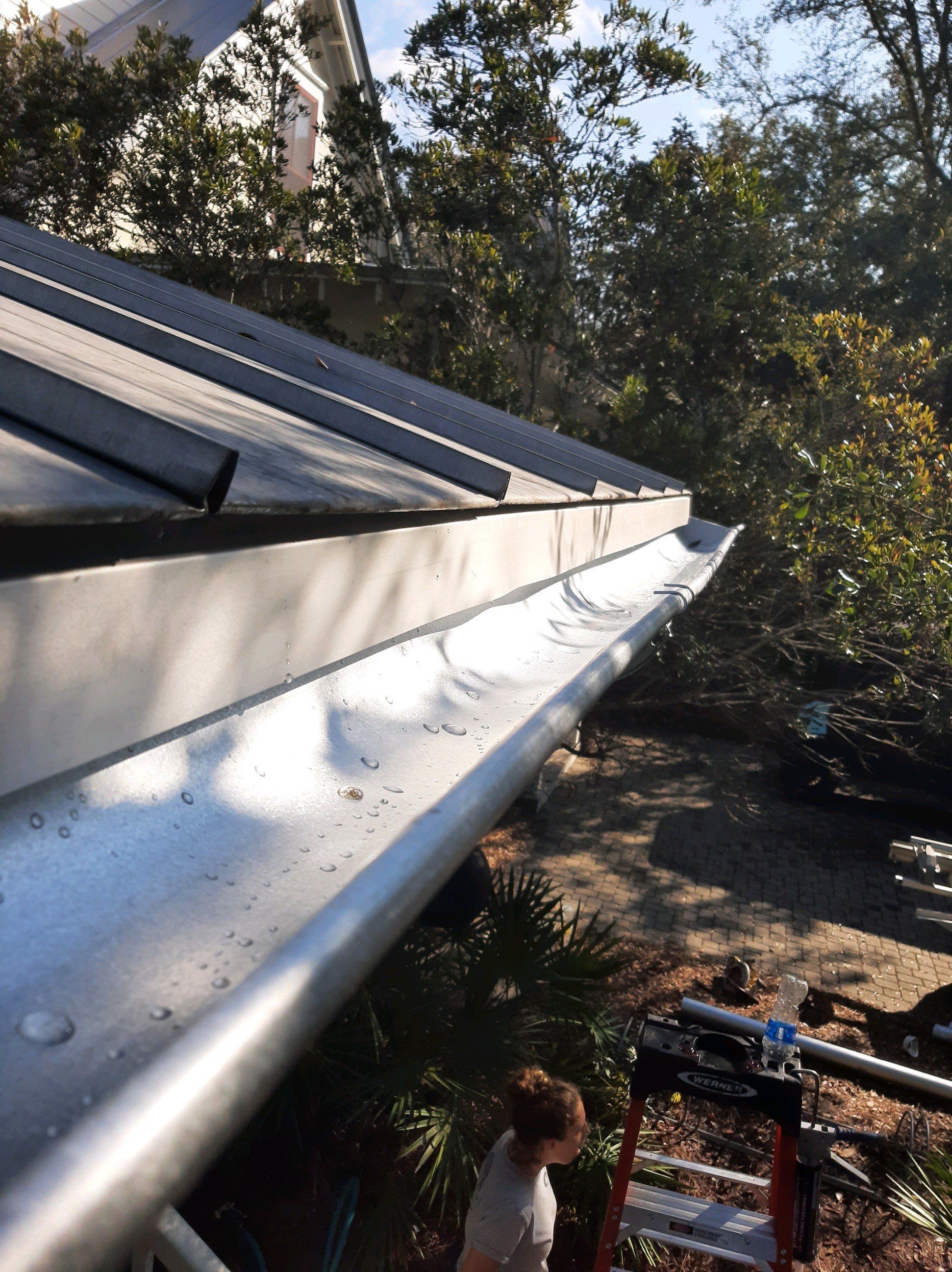 Gutter Installation using Galvalume Half Round Seamless Gutters by Gutter Professors