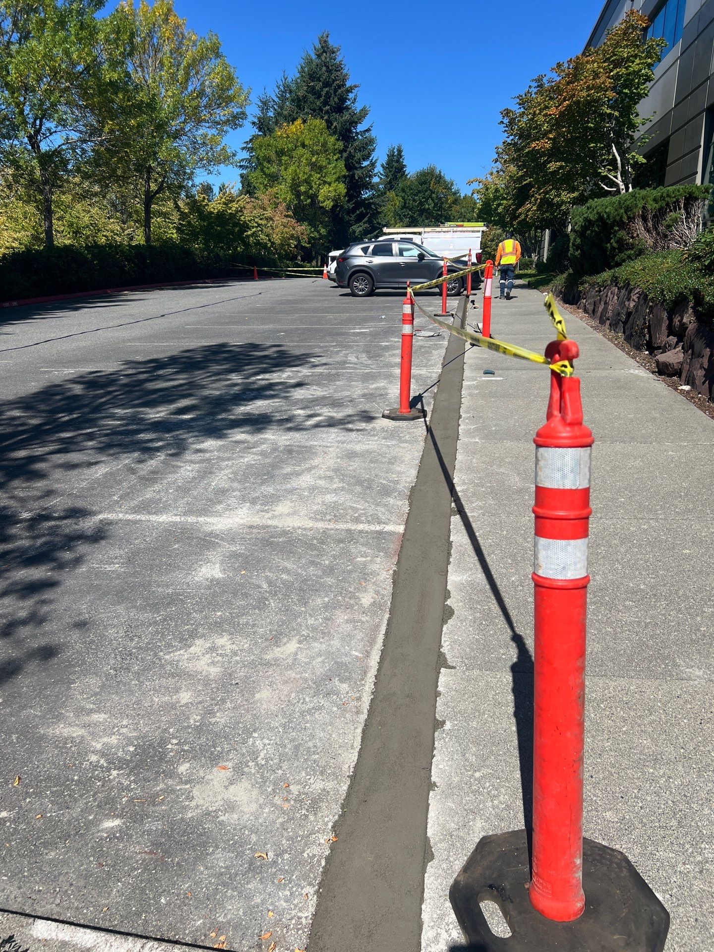 Kidder Matthews | Parking Lot Sealcoating & Striping with Concrete Curb & Patch Repairs  by Jireh Asphalt & Concrete Inc 