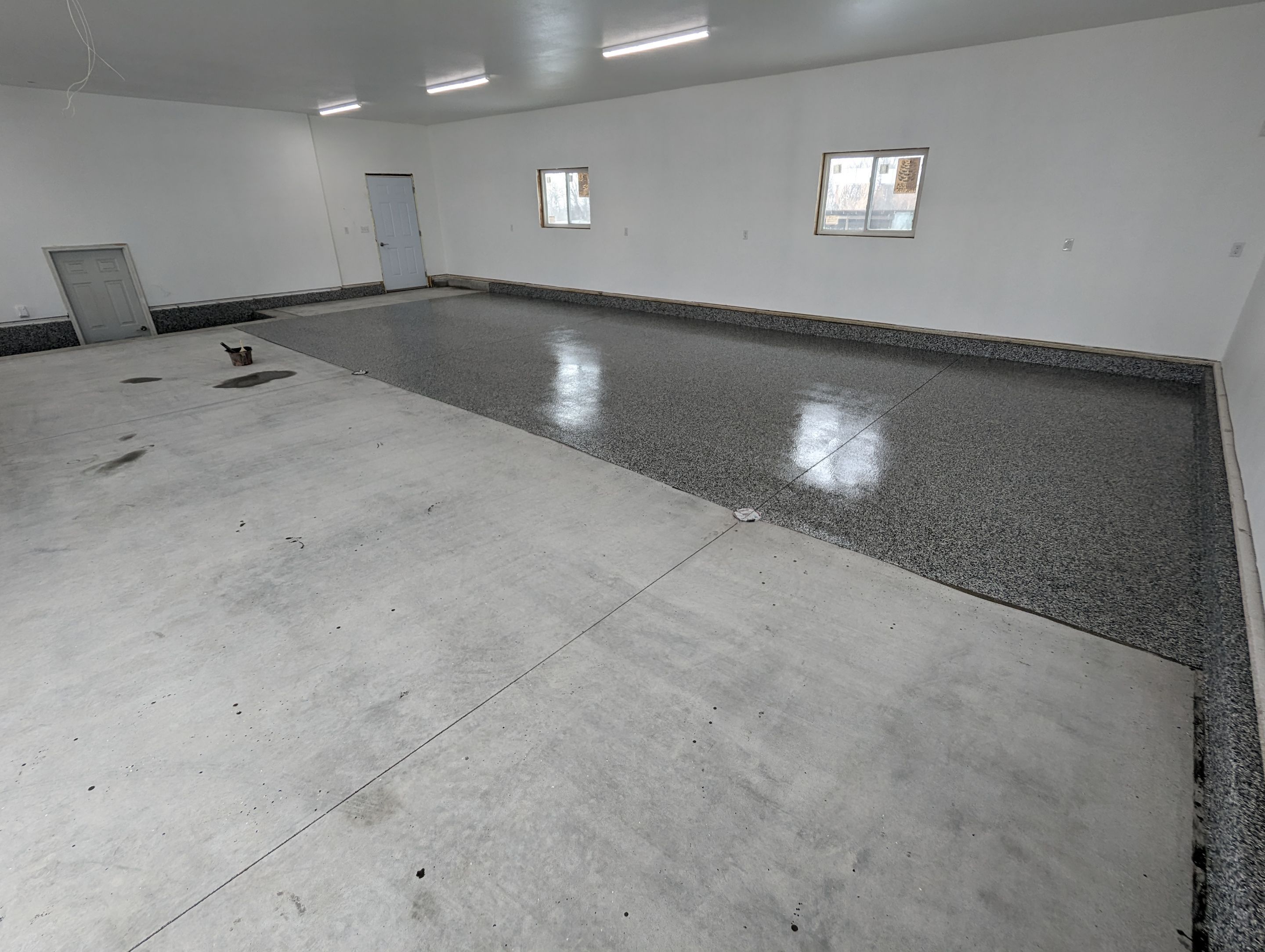 Garage using Domino  by Select Painting, Coatings & Garage Cabinets