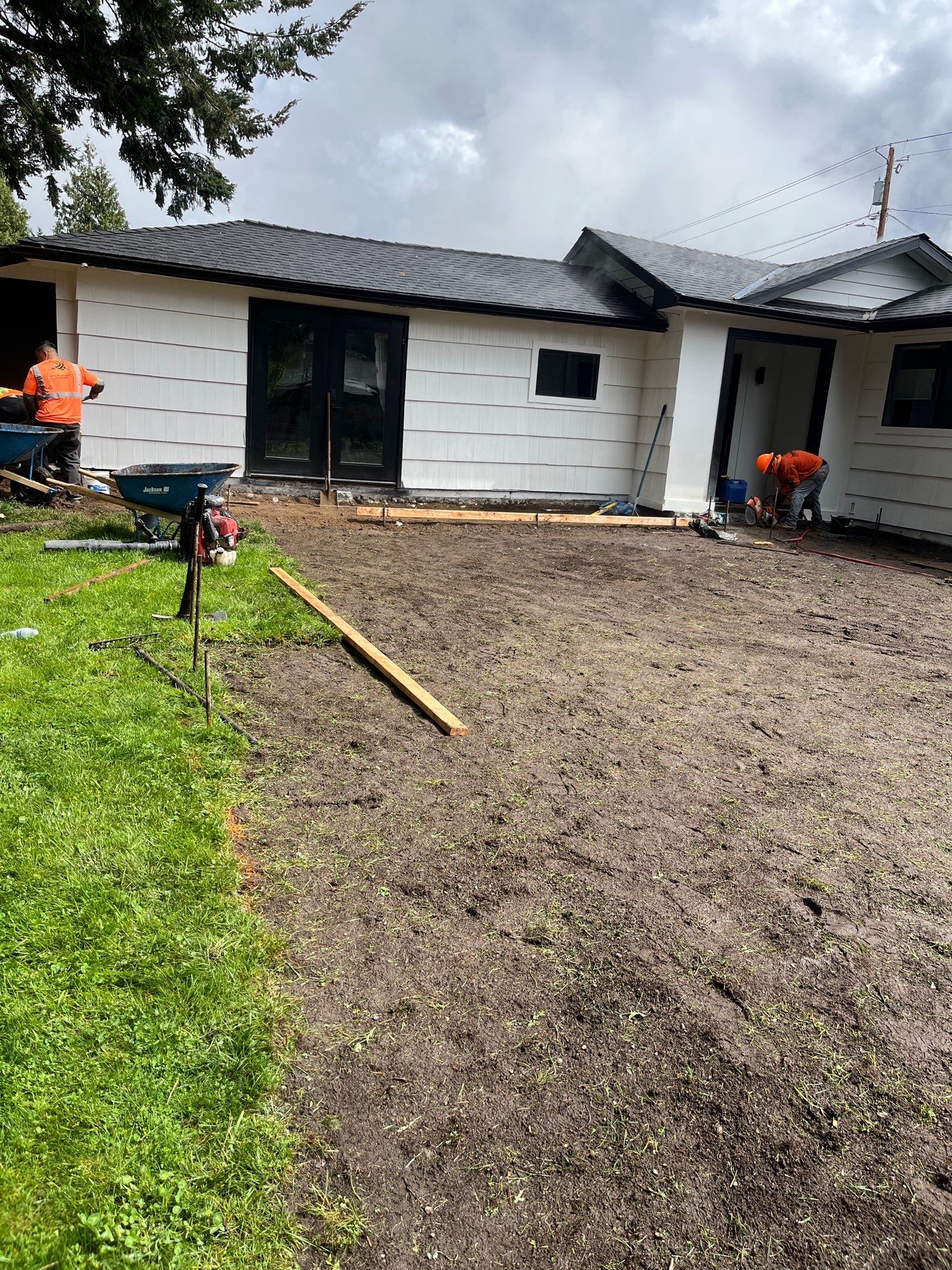 John | Concrete Backyard Walkway by Jireh Asphalt & Concrete Inc 