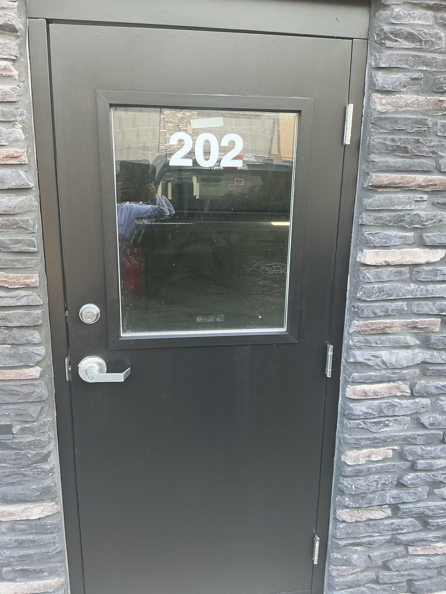 Commercial Exterior Door Repaint by Midwest Paint LLC