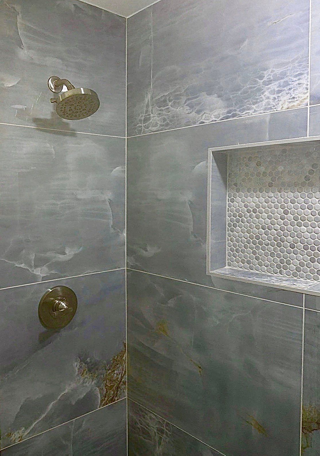 Elevated Bathroom Renovation featuring Oceanic Tile in Ormond Beach by Acies Renovations