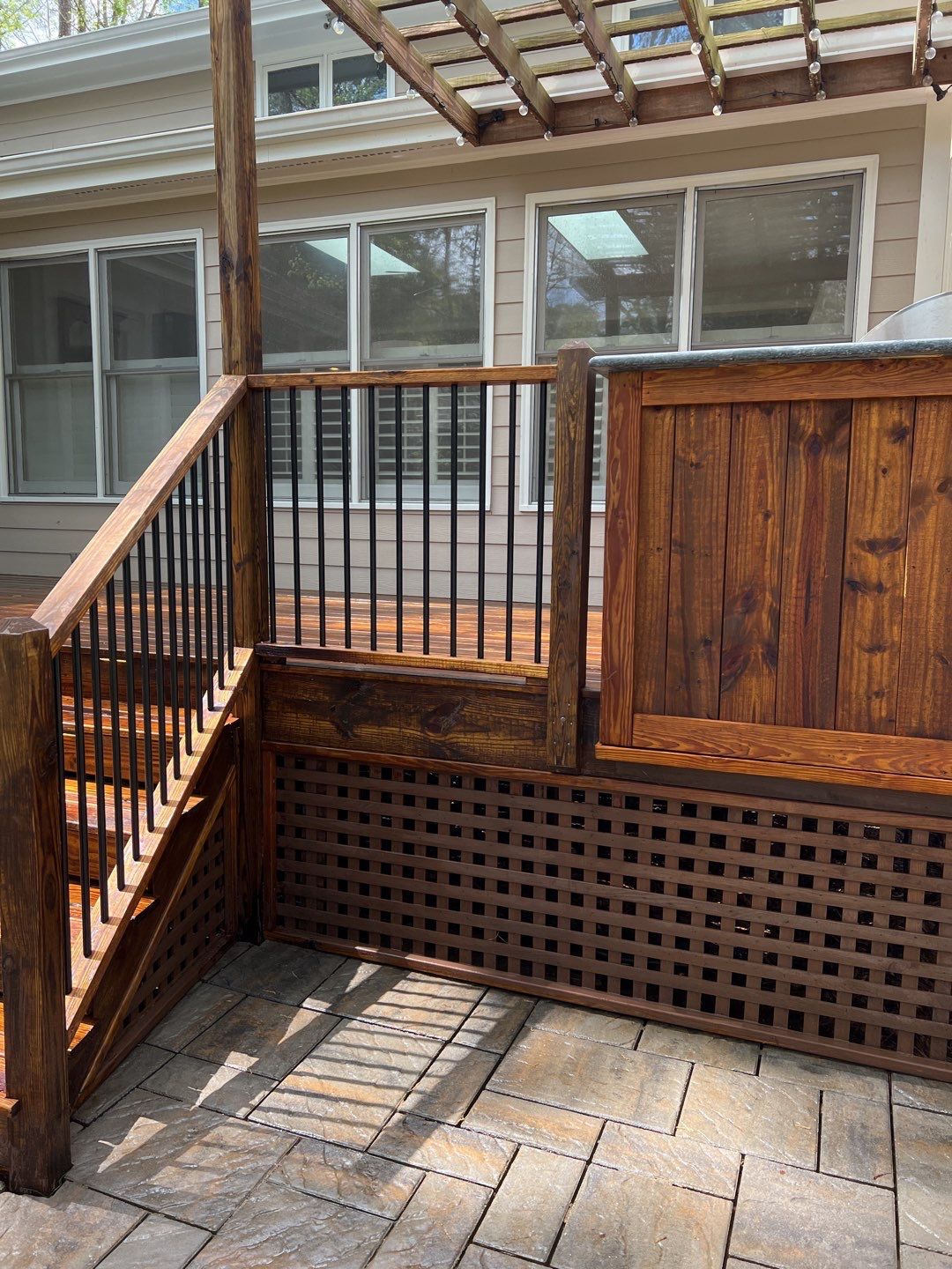 Deck and Stamped Concrete Patio by DuraSeal