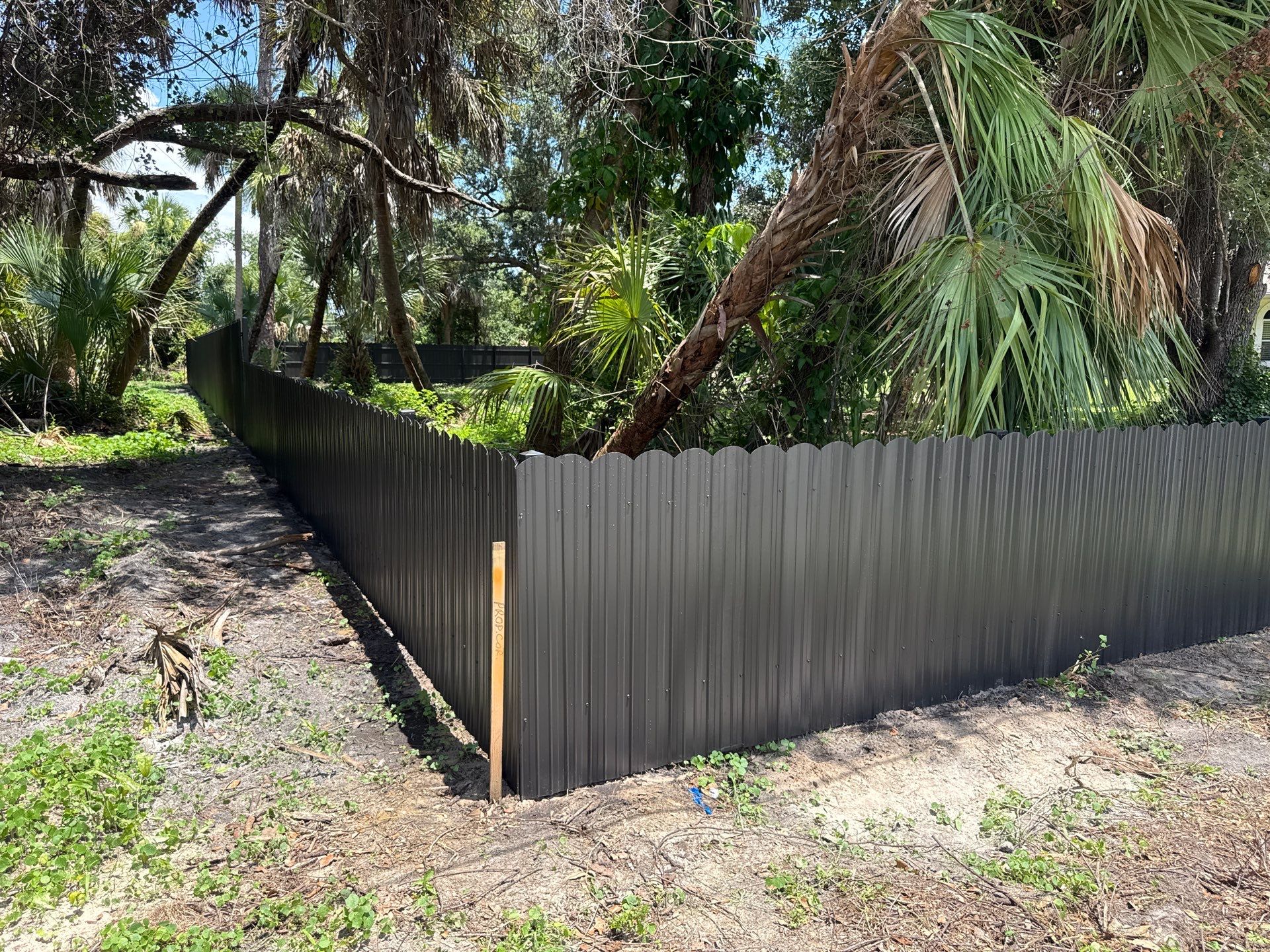 Bronze Scalloped Metal Privacy Fence Installation in North Port by True Fence LLC