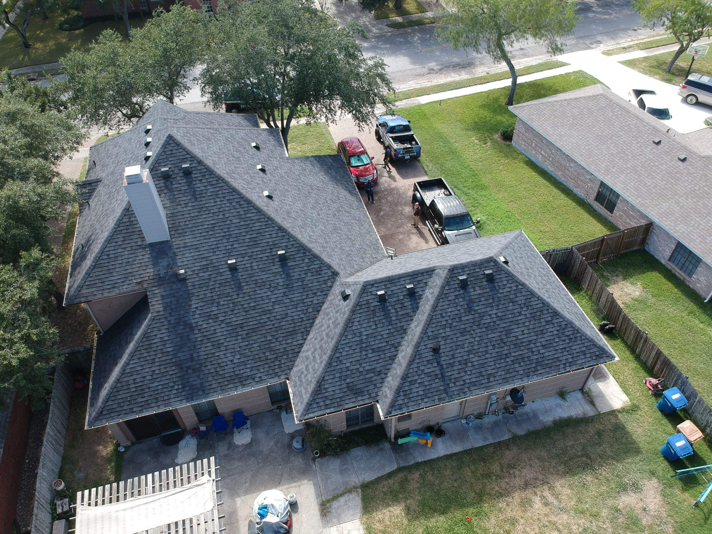 Residential Roofing Installation using Certainteed Landmark Moire Black by Galvan Roofing and Construction