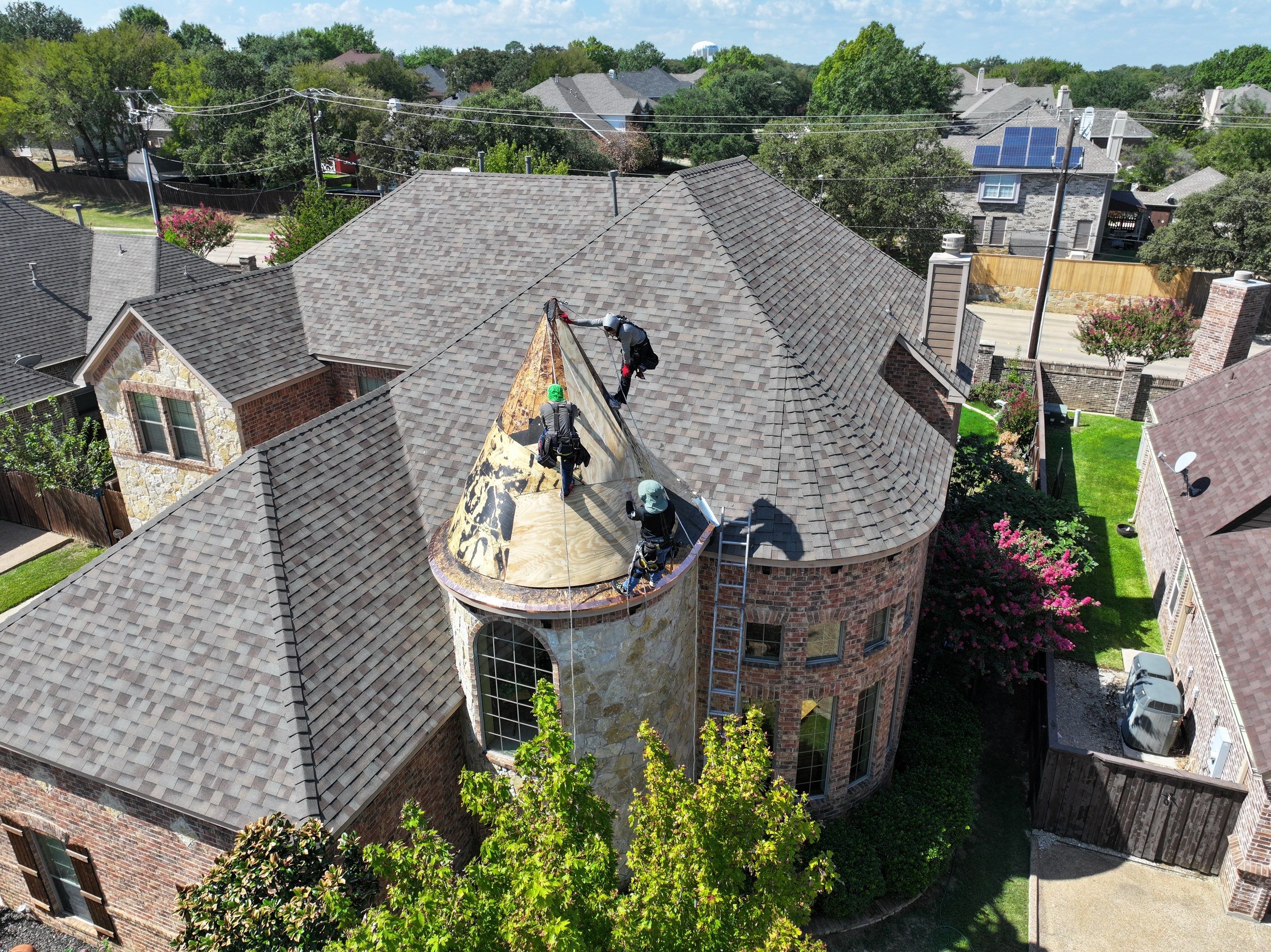 Installing Custom copper turret and Malarkey Vista Class 4 shingles Hail Damage Upgrade by Becker Roofing and Exteriors