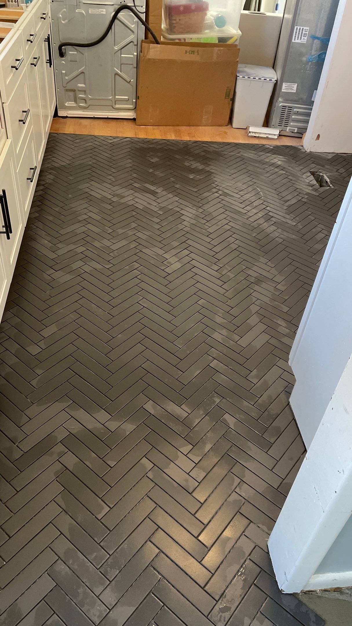 Kitchen Backsplash and Herringbone Tile Floor Remodel by Footprints Floors of Coastal Carolina