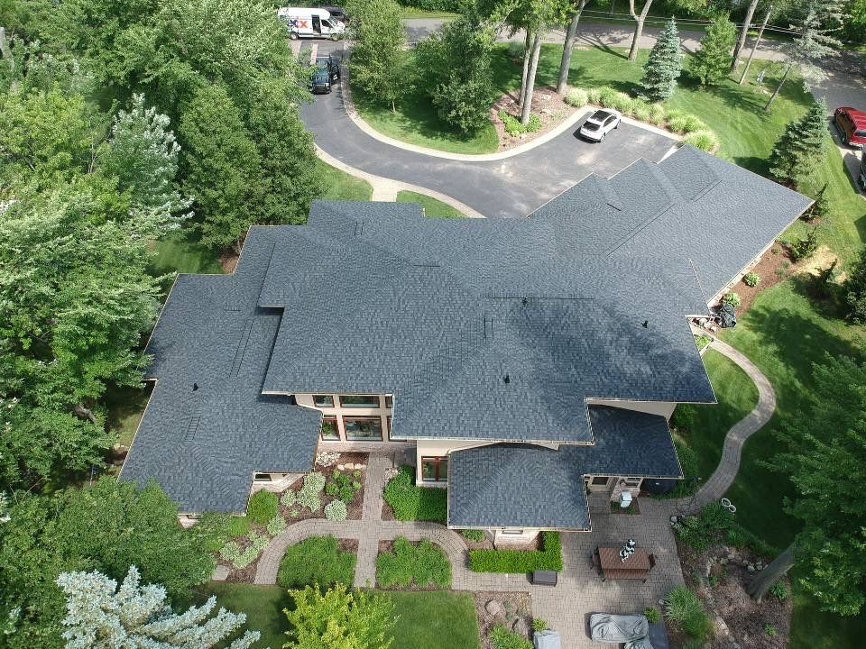Large Lakeside Roof Replacement by Bloomfield Construction & Restoration